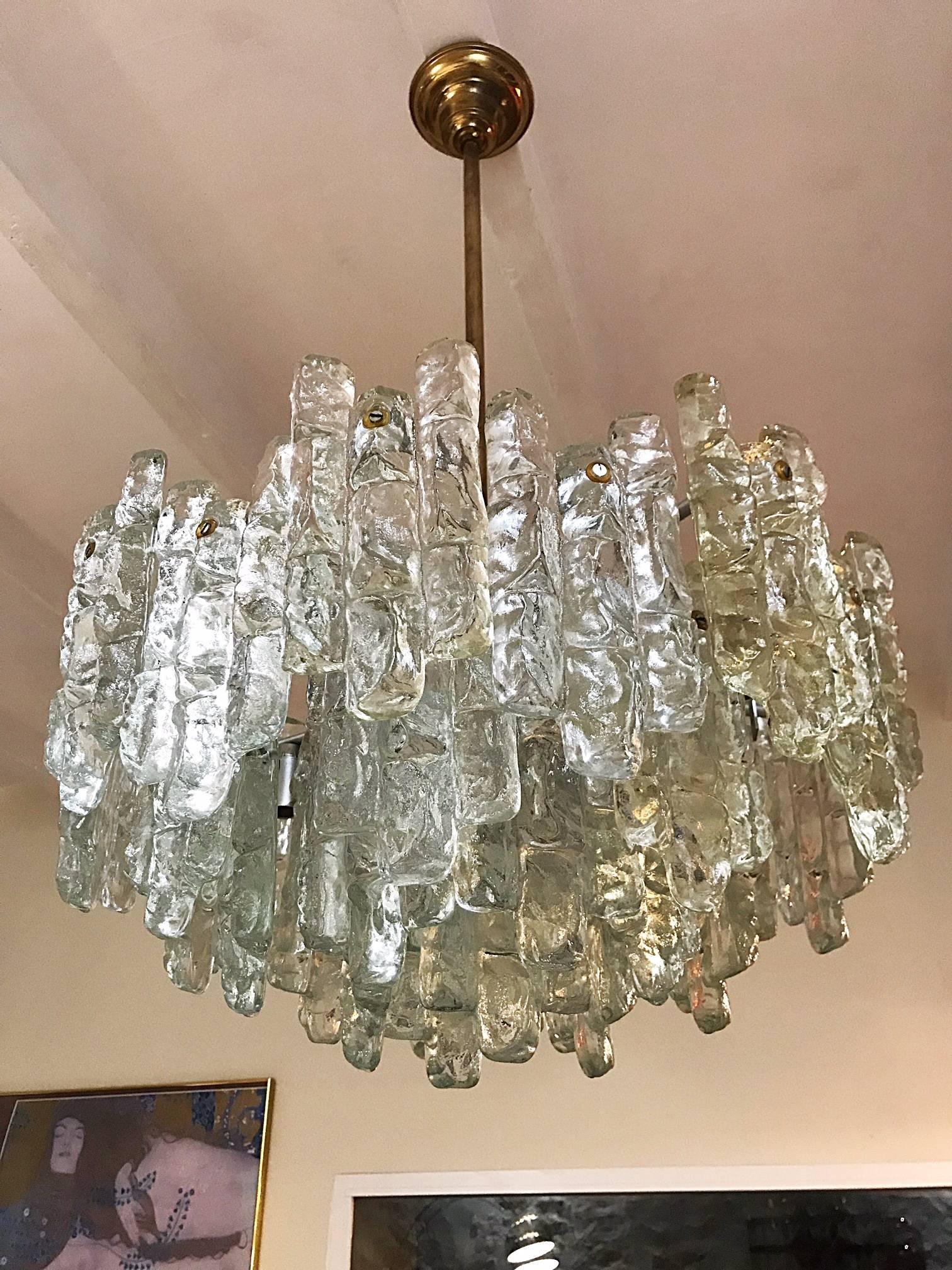 A tiered glass chandelier on a chrome frame by J.T. Kalmar, Austrian, 1972.
Lovely design, each chandelier has sockets (E27). Measures: 36 Pieces , 60cm.
A real stunning ORIGINAL vintage period lamp !! Model made in hand-made by the greatest