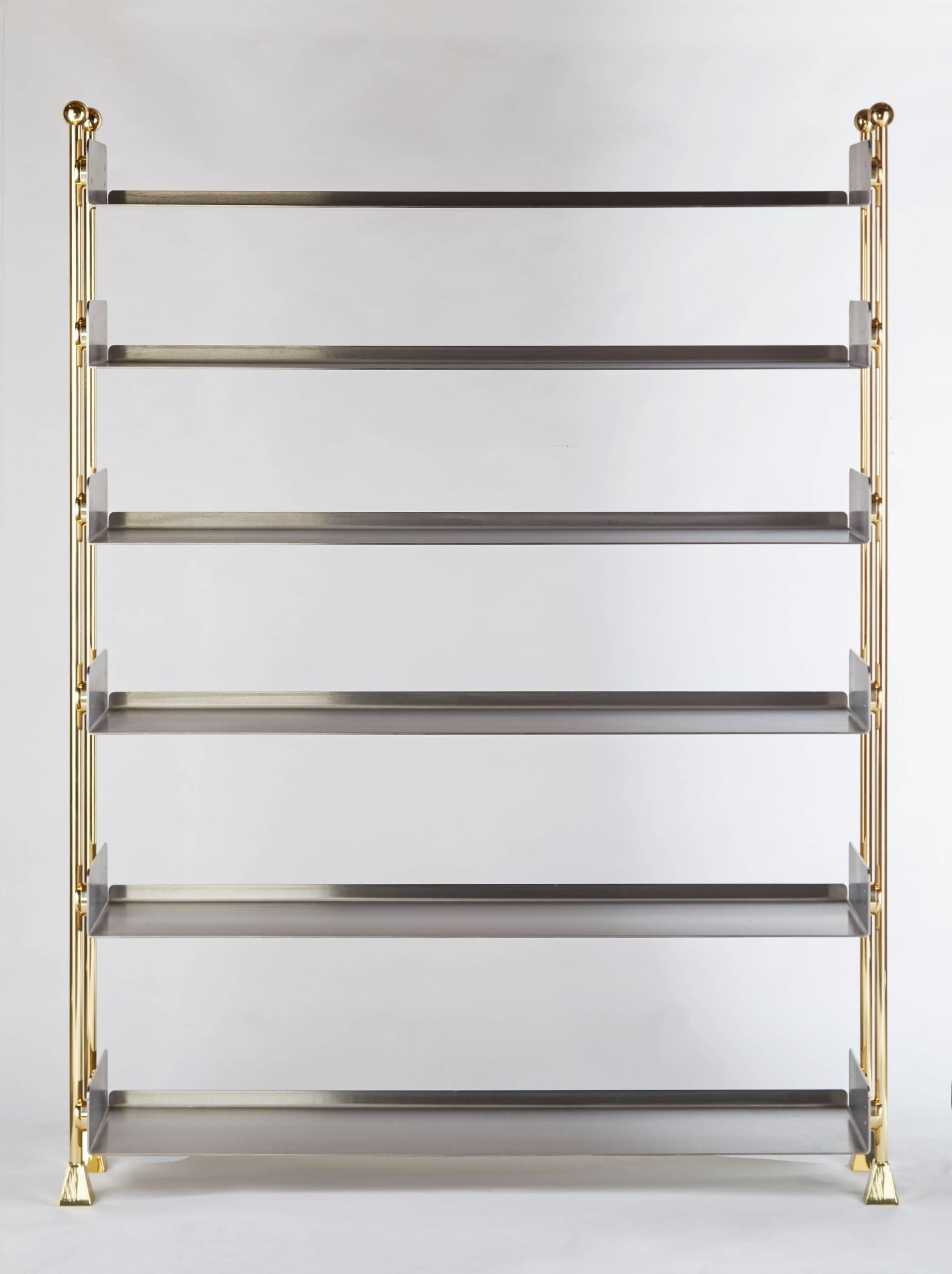 The Vienna Bookshelf is made by hand and designed by Troy Smith. This bookshelf is extremely well-built and is virtually indestructible. This bookshelf is made from solid brass and solid stainless steel. The brass has been mirror polished and