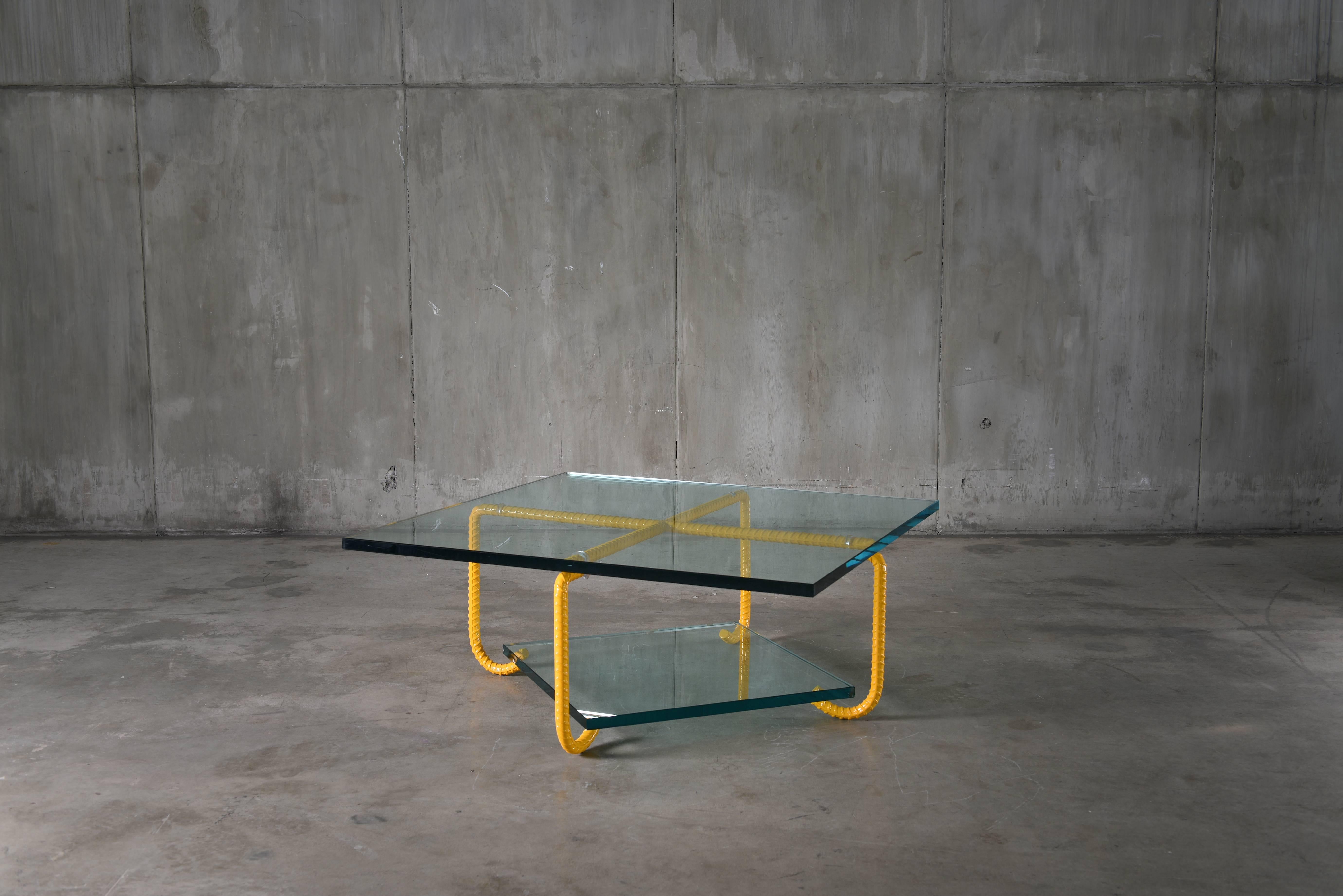 The Ra Coffee Table is part of the Rebar series created by artist Troy Smith. The rebar is the steel used in the forming of concrete to give it strength. Rebar is heated with acetylene torches and red-hot forges, Skillfully sculpted by hand and with
