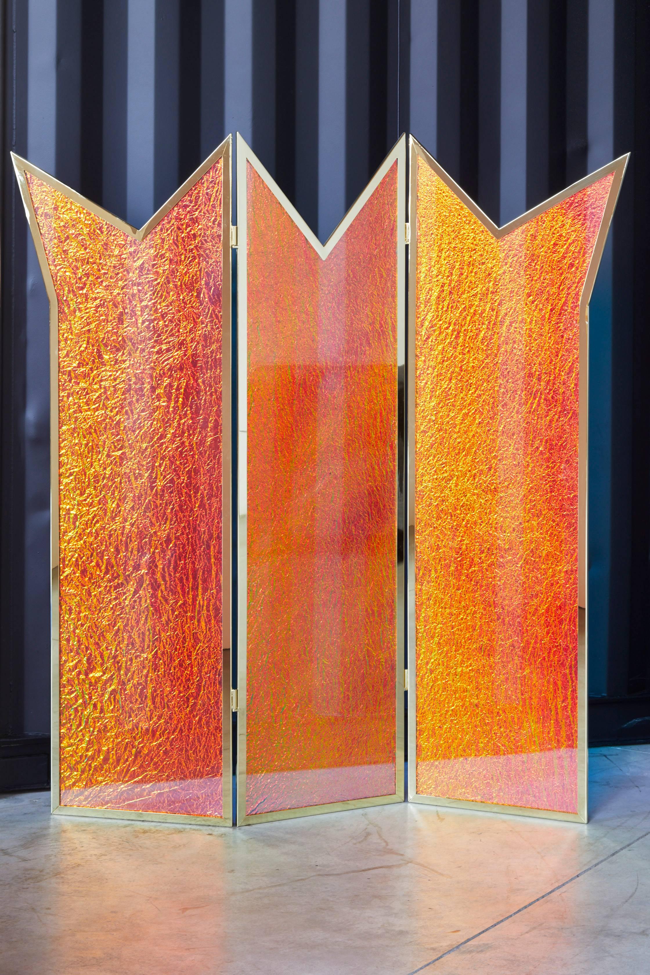 The Crown room divider was built and designed by artist Troy Smith. This contemporary and one of a kind room divider is made out of the highest grade of materials. Inspired by glittering gold and polished gemstones of kings and queens crowns. Made
