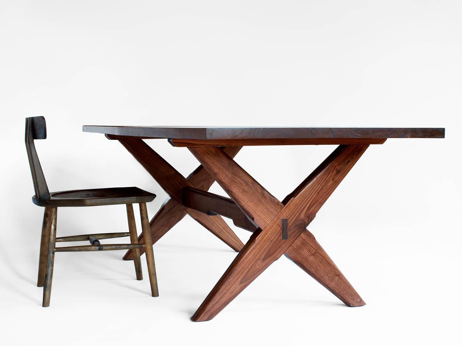 The Founders dining table is a modern interpretation of the Sawbuck style table. Available with a hexagonal, oval, live edge or rectangular top and featuring traditional and modern joinery techniques. Custom sizing is available. Wood options include
