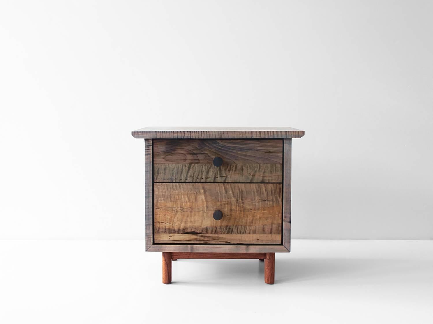 The spring side cabinet is a solid wood case piece that features leather, turned brass or turned hardwood pulls. Available in Claro walnut, black walnut (natural, oxidized or ebonized), maple (natural, bleached, or oxidized), cherry and white oak