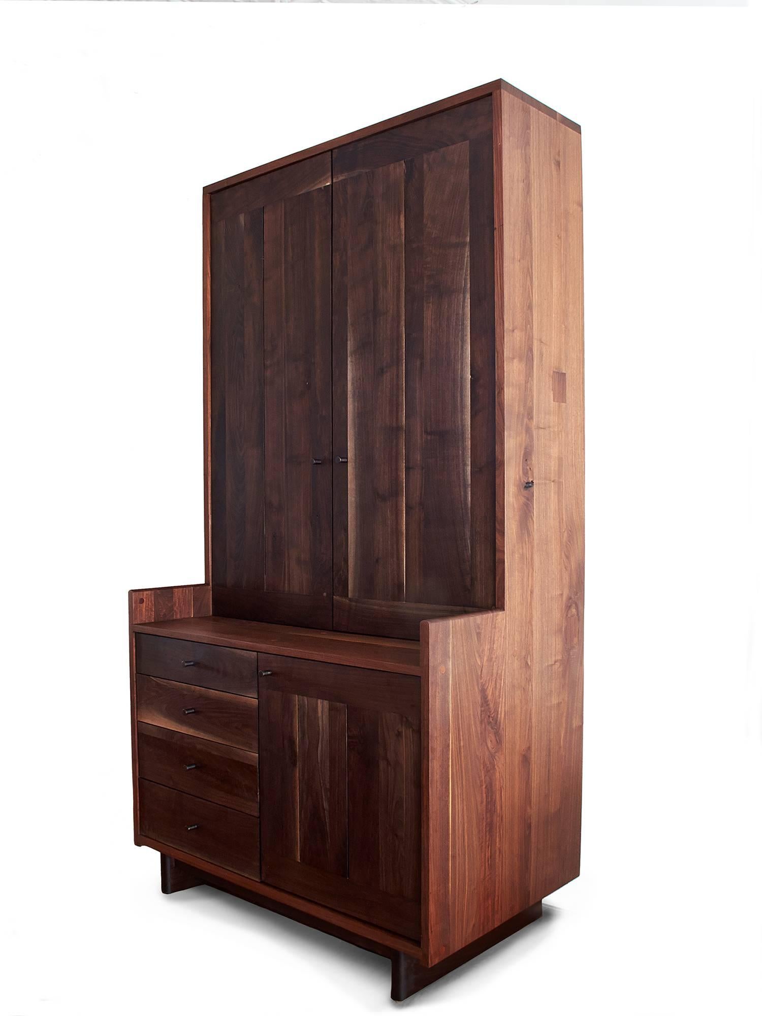 The Lenox Pantry features solid walnut construction with brass hardware and leather door stops. Customized sizing and configurations available including glass doors.

Available in black walnut (natural, oxidized or ebonized) and claro walnut.