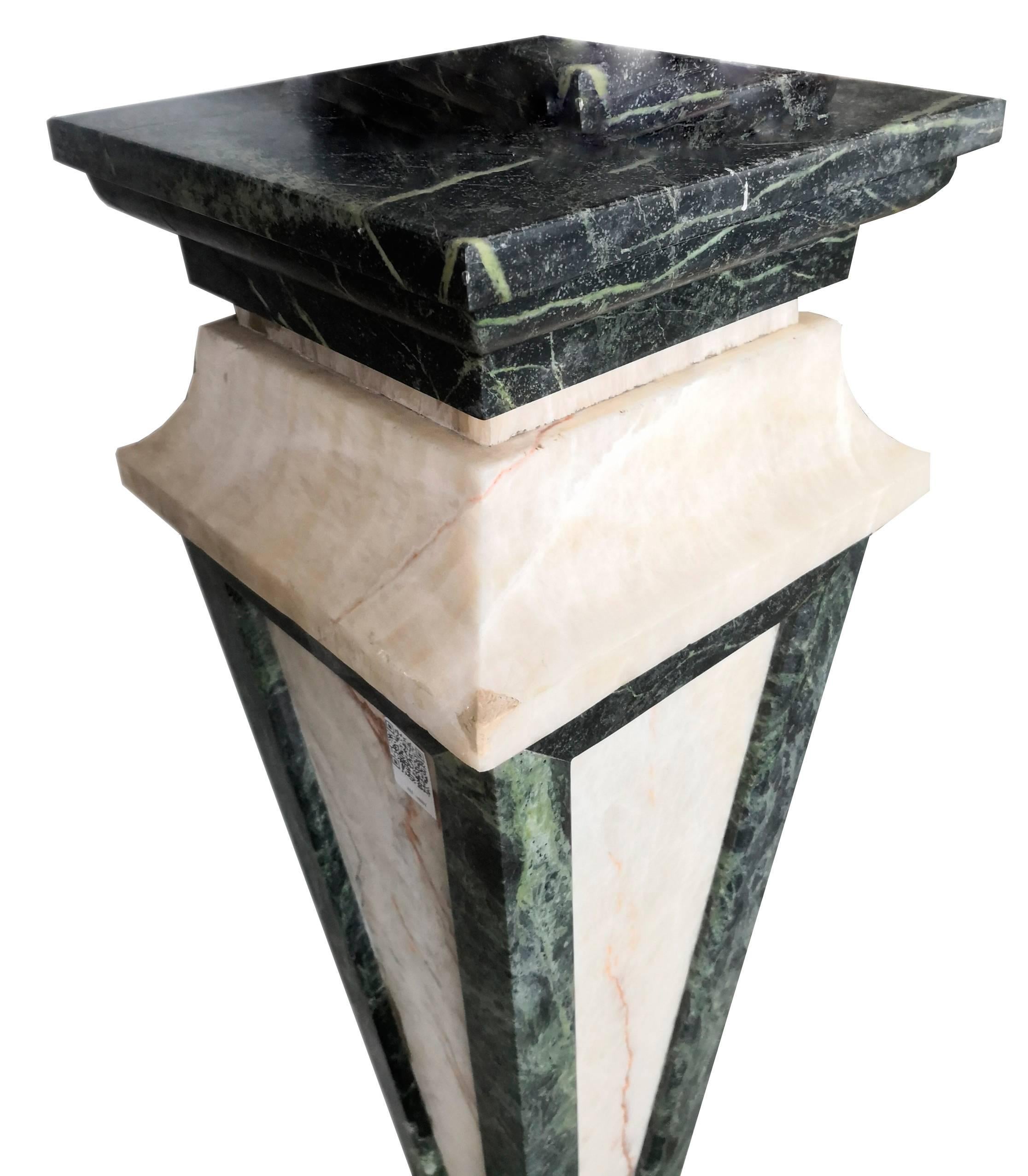 Pair of Italian hand carved pedestals, made in green serpentine marble and lightly translucent honey onyx.