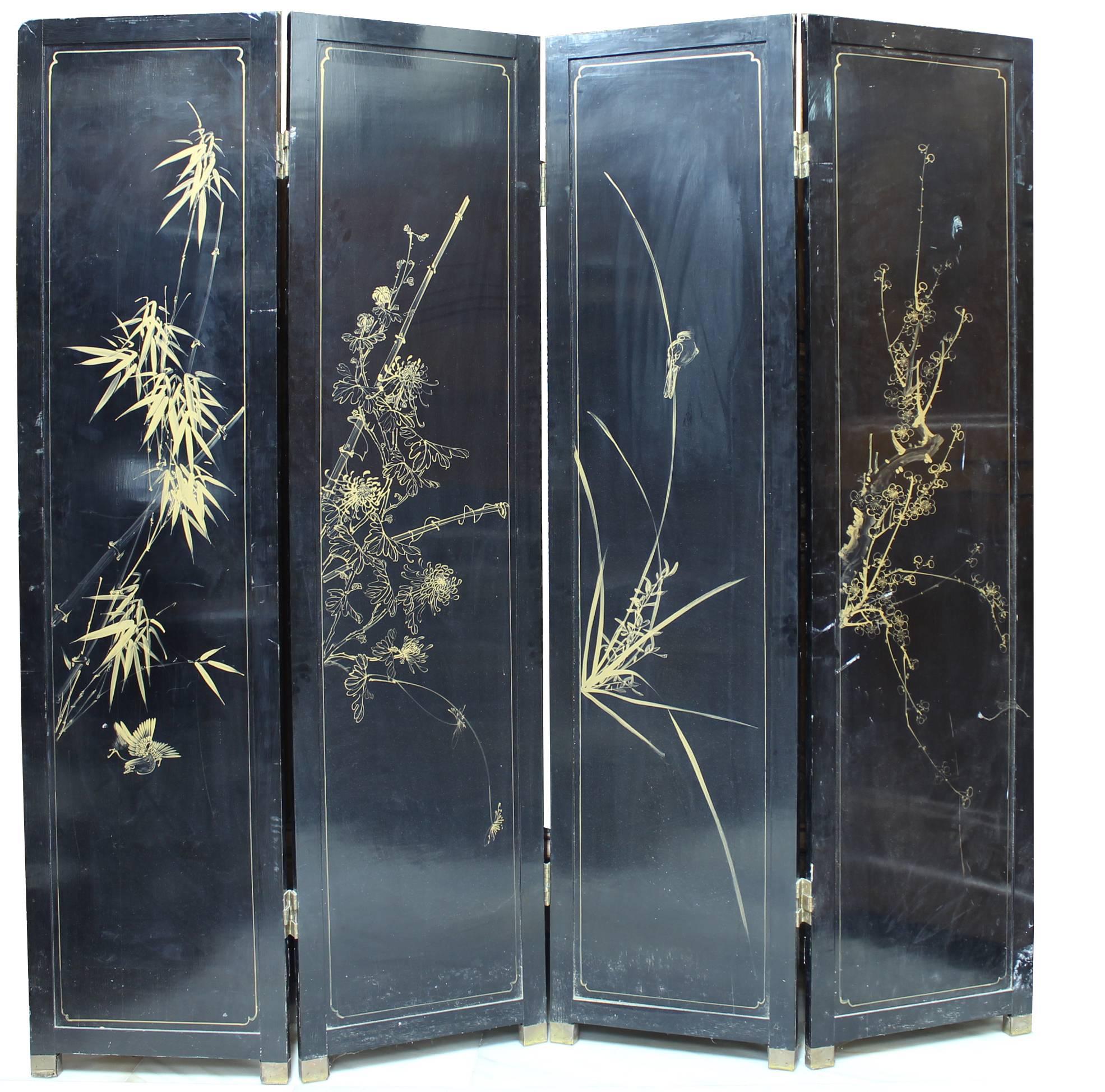 Four-panel blanck and white lacquer screen decorated with a natural scene of birds and plants made with different colored jade and other hard stones. 

