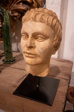 Classically Inspired Male Bust Carved in Marble & Set on a Metal Base.