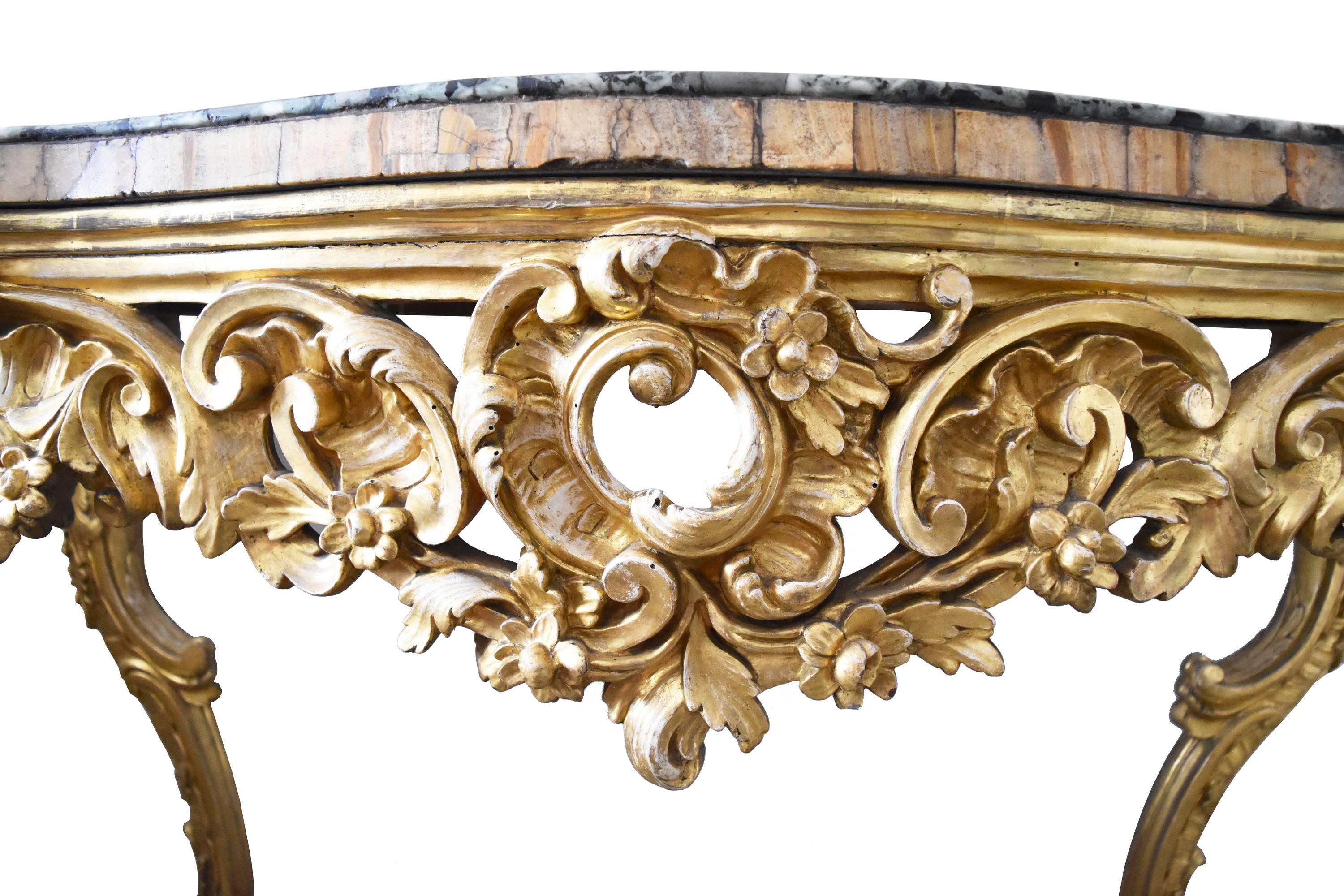 Stucco 18th Century, French Gold Guilted Console Table with Fossilized Marble Top