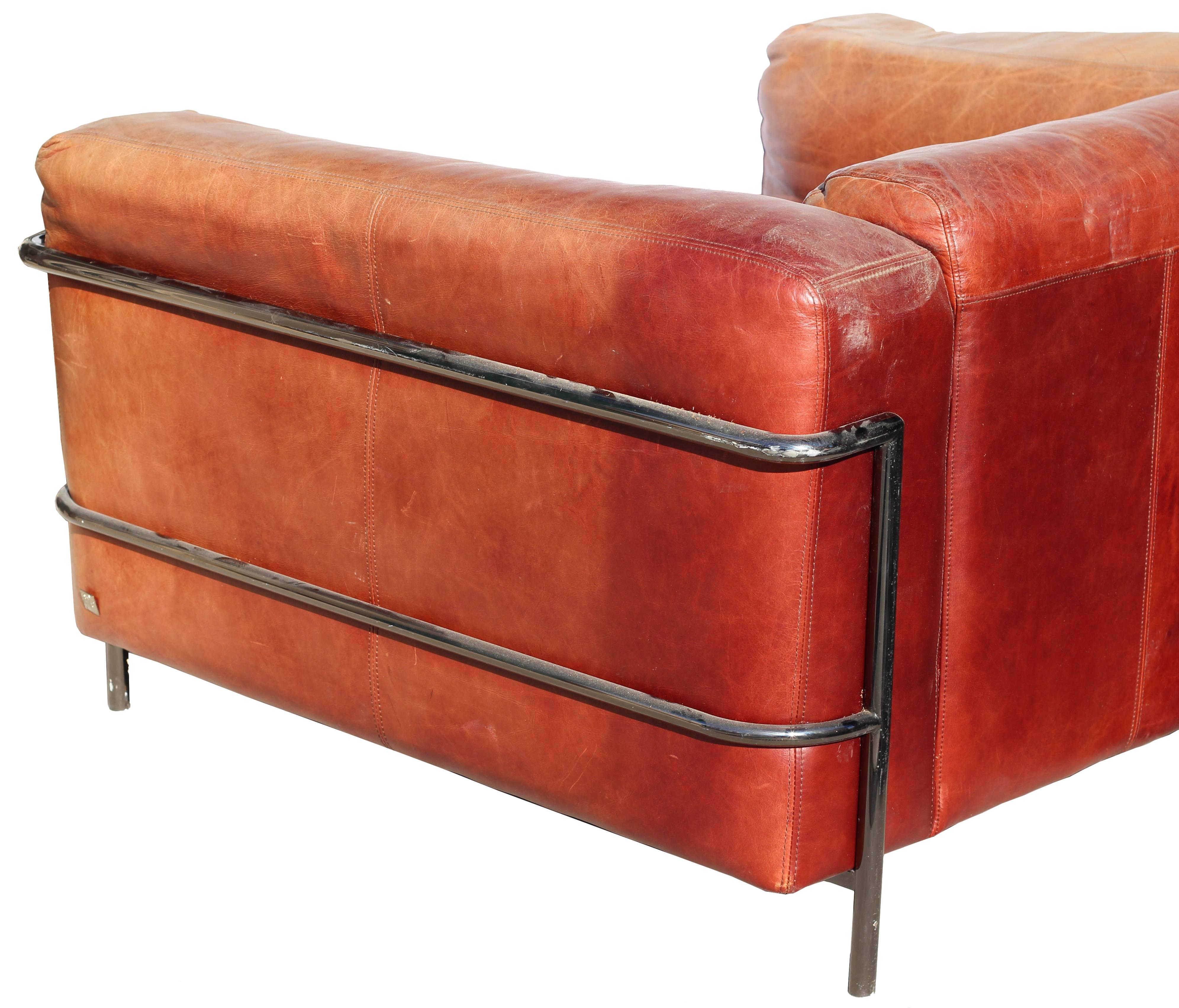 Comfortable first class leather sofa encapsulated in a steel structure.
