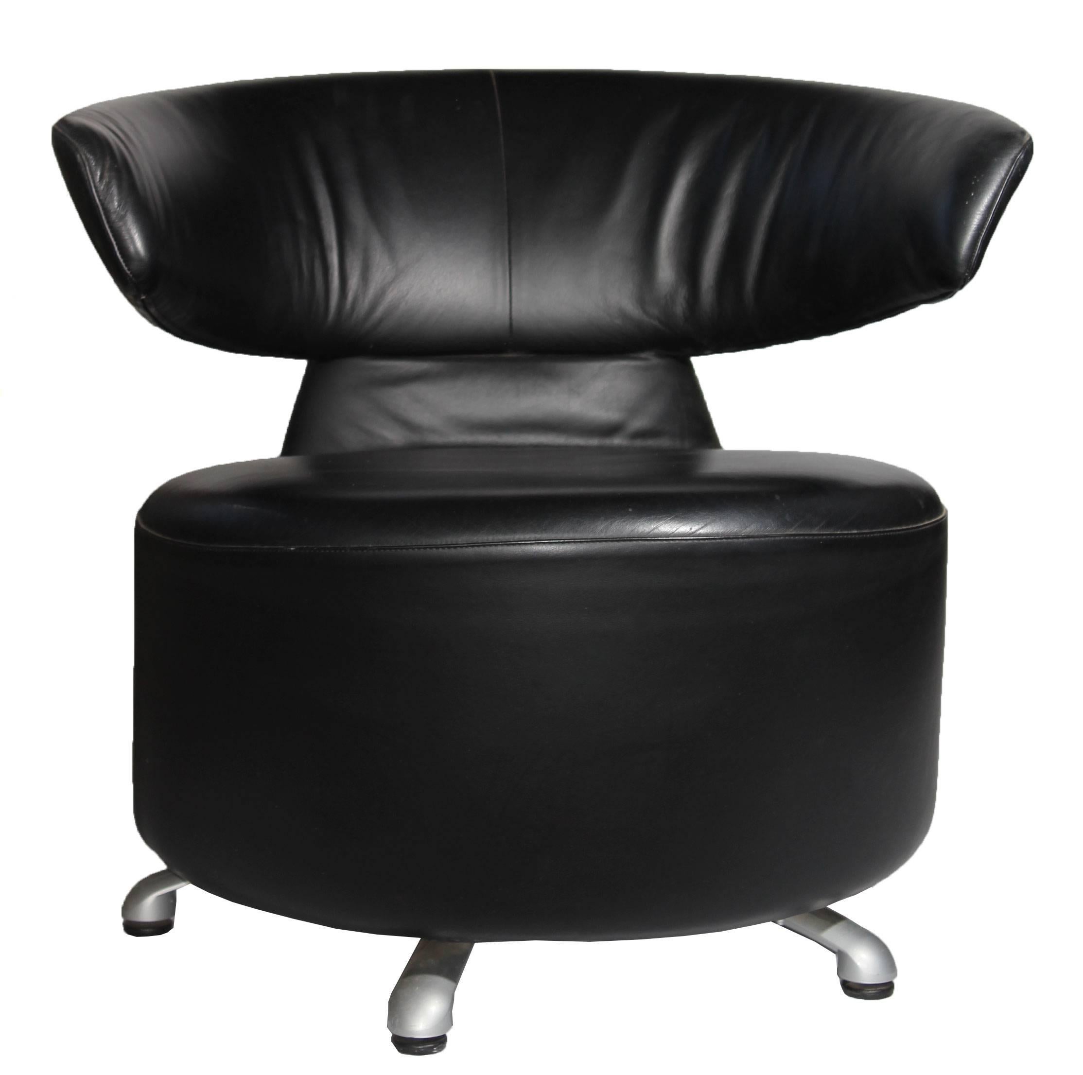 Black leather swivel backrest with armrests (biki) on a fixed steel base designed by Toshiyuki Kita for Cassina in 2000. Moulded CFC-free polyurethane foam and polyester wadding and removable leather covers.

 