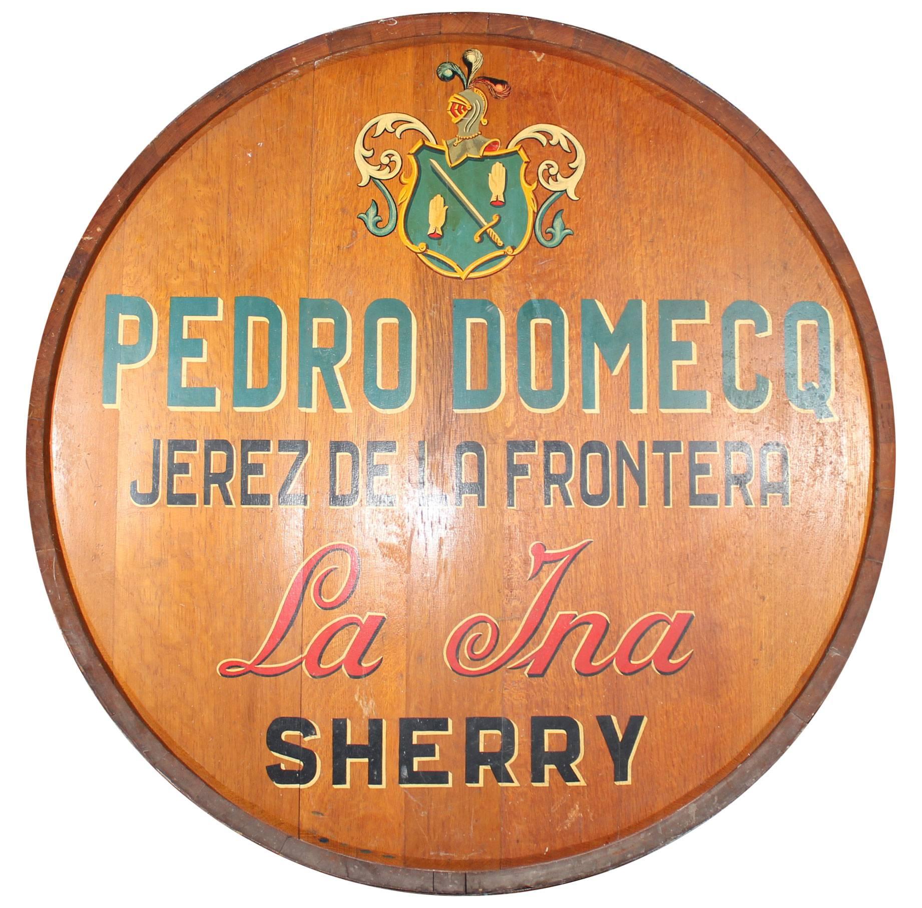Original wooden casket face, including the iron rings, with hand painted Pedro Domecq sherry winery shield, name, city and the brand, "la Ina", which is still being sold nowadays. Meant to be hung on a wall, the barrel front is perfectly