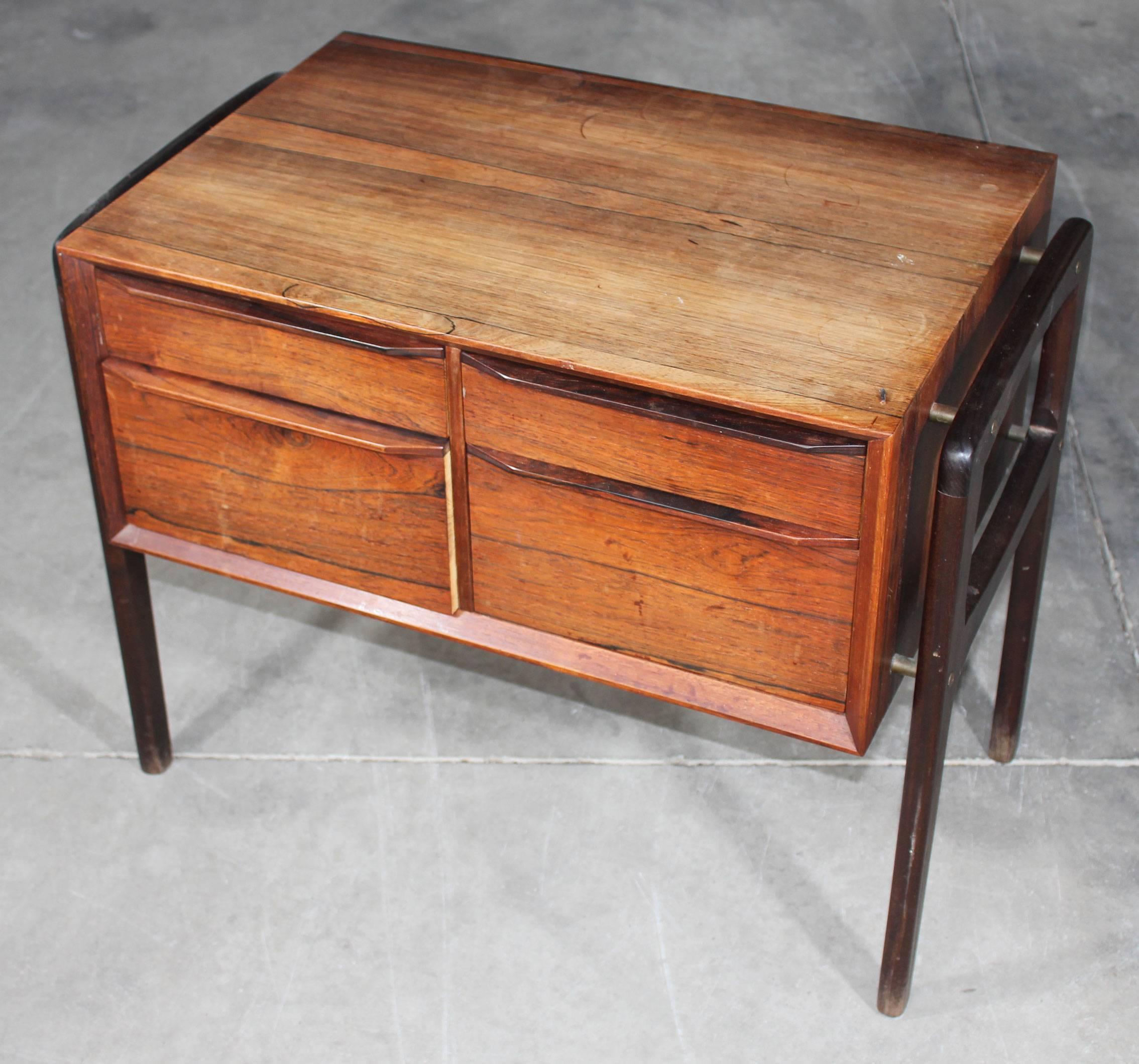 Vintage scandinavian 50's rosewood side table with four drawers.