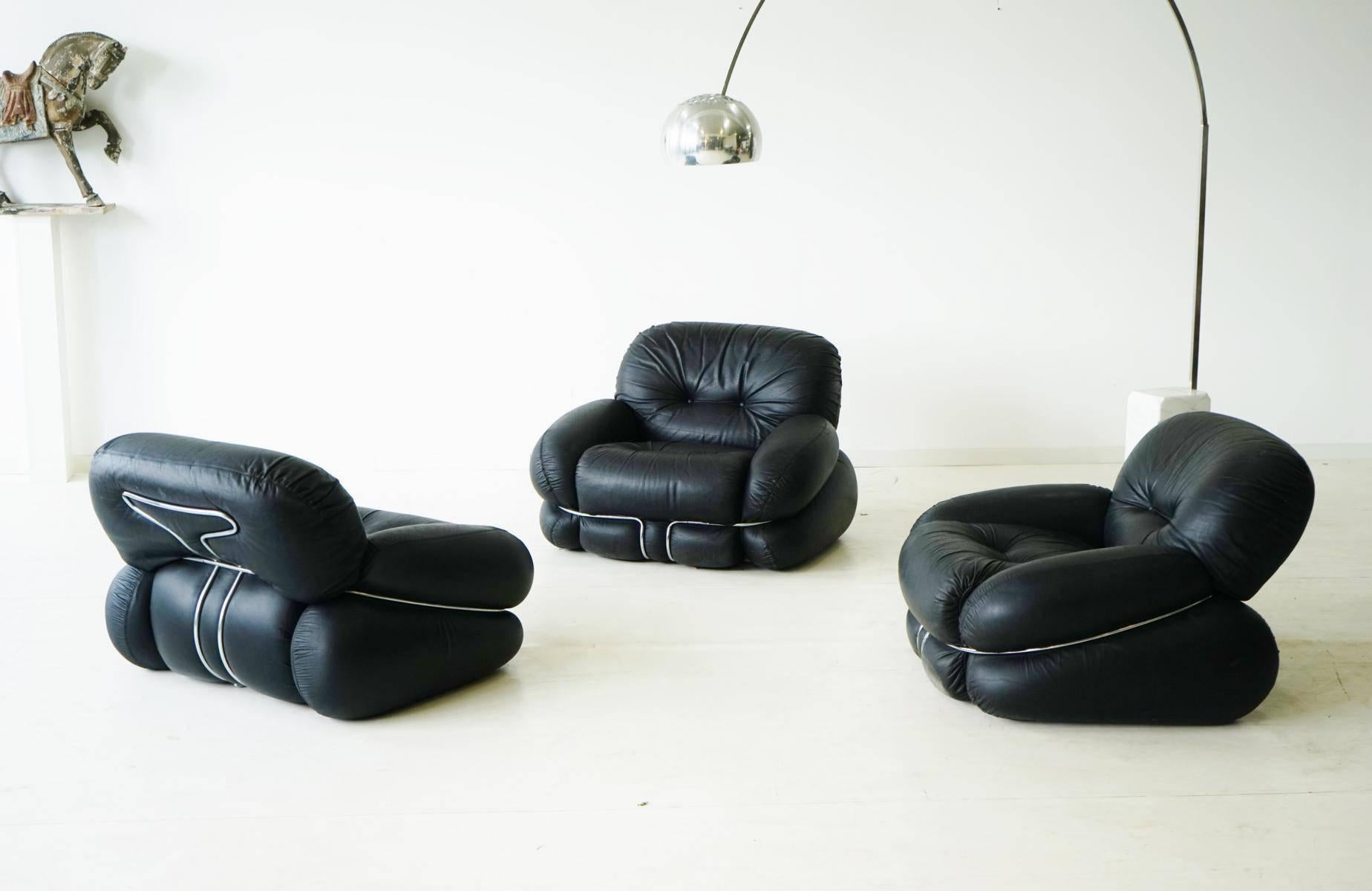 Trio set of Italian leather lounge armchairs 