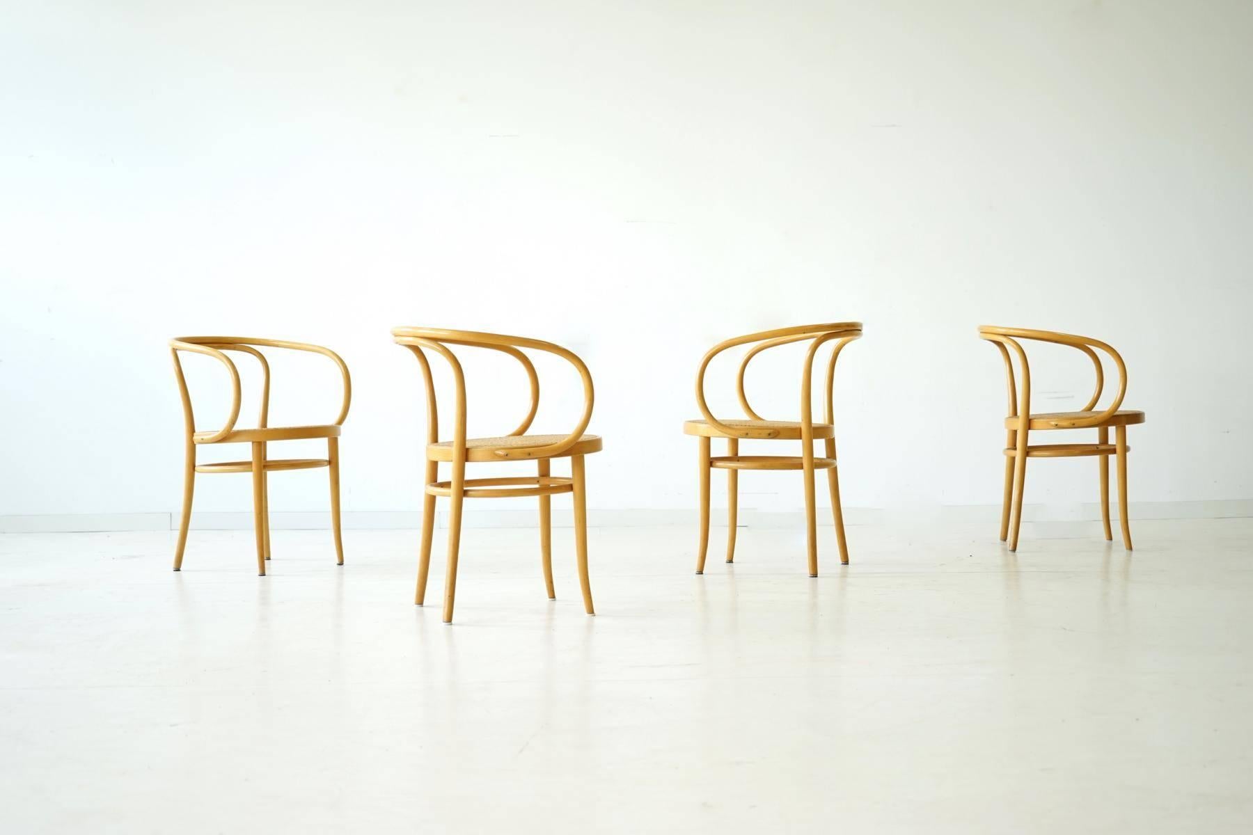 Set of four bentwood classic No. 209 Thonet armchair Bauhaus. The sculpture under the bentwood chairs.
Model: 209, Design: Brothers Thonet, 1900. Swiss architect Le Corbusier was fascinated with it and used it in many of his buildings, for example
