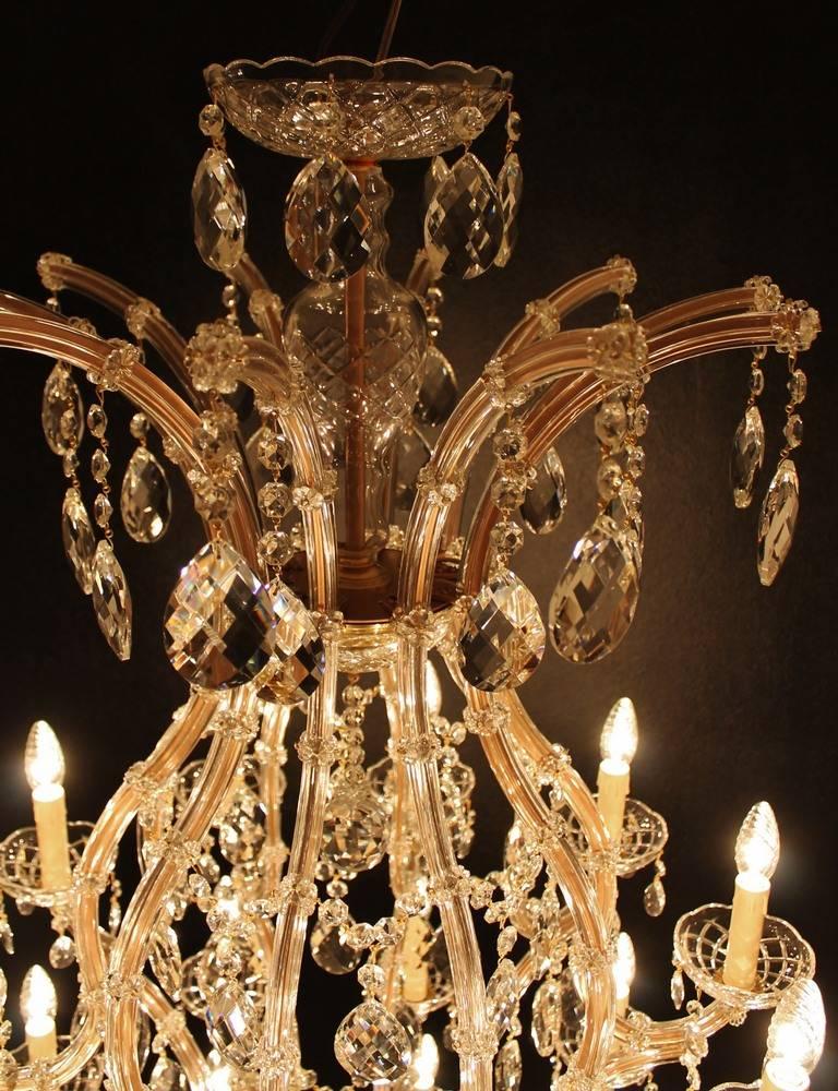 Large Maria Therese chandelier with 31 lights, high model. This new chandelier is custom-made in the Netherlands. The new chandeliers are made of the best materials and are available in a brass or silver colored frame.

Often clients are looking for