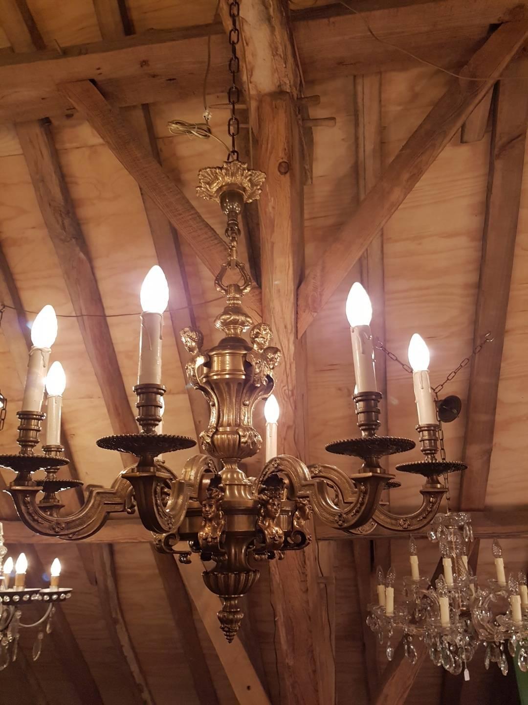 Heavy bronze chandelier eight light Louis XVl Style including strong and long original chain.
This is just one of the collection of 1000 chandeliers, ceiling lamps and wall lightning. Our collection is very diverse and includes crystal chandeliers,