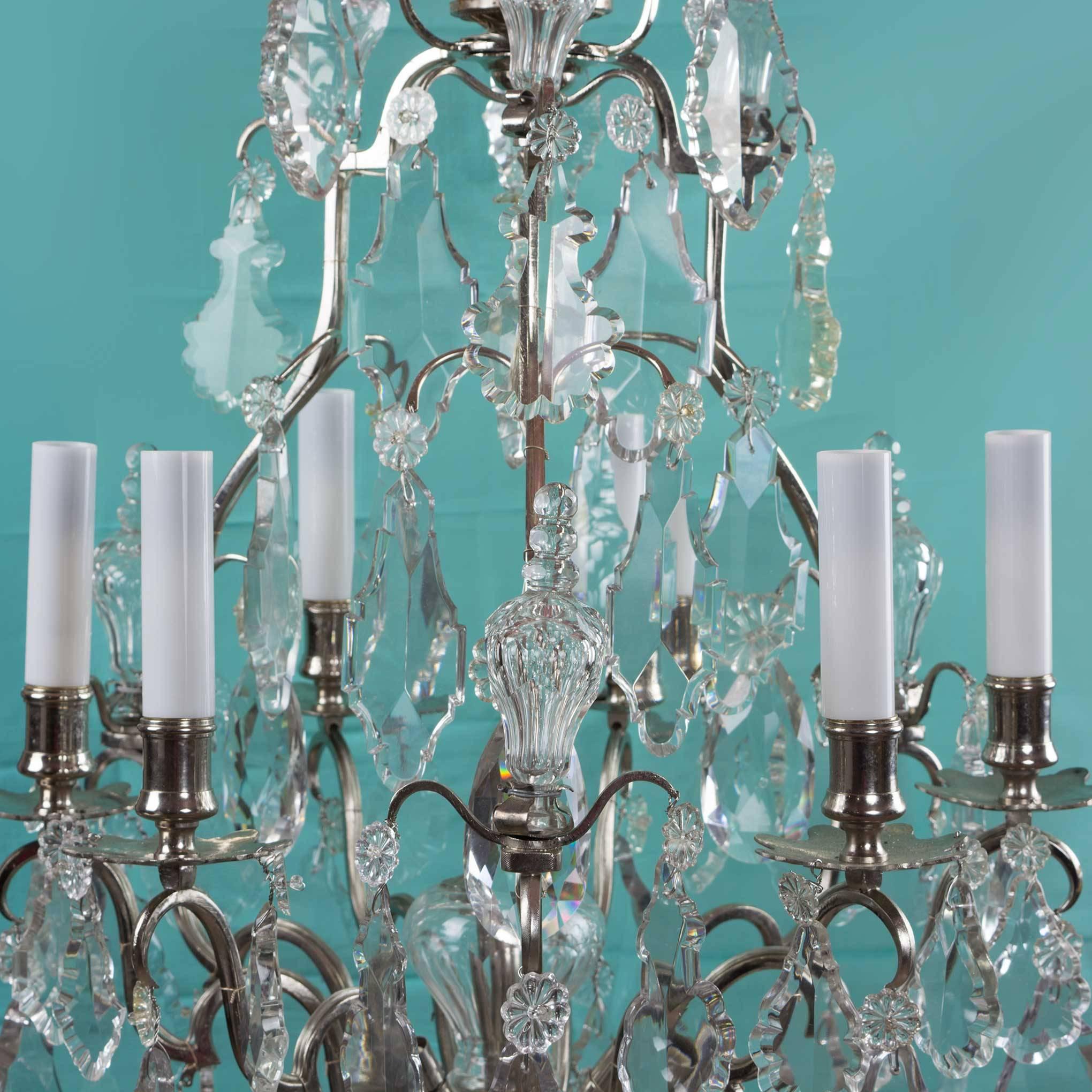 With a thousand gleaming shafts of light, this gracious Baccarat style chandelier infuses a room with incandescent elegance. Still as awe inspiring as the day it left the original Lorraine glassworks in eastern France, 150 years ago, it has since