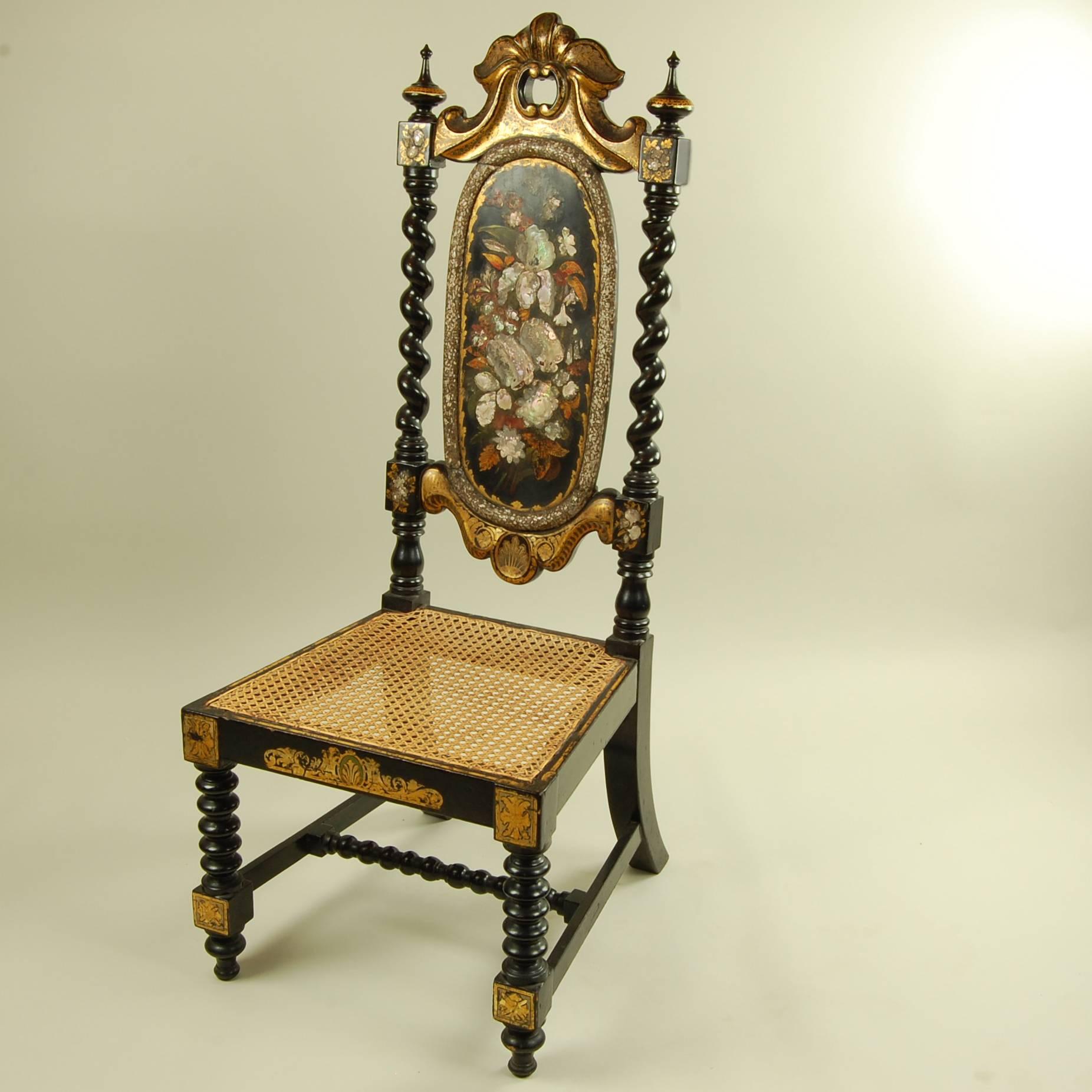 Beautifully wrought, and obviously rarely sat in over the years, this ornate side chair would make a perfect accent piece for a formal entry hall or parlor. A unique blend of traditional styles, dating from circa 1890. Sturdy ebonized wood with