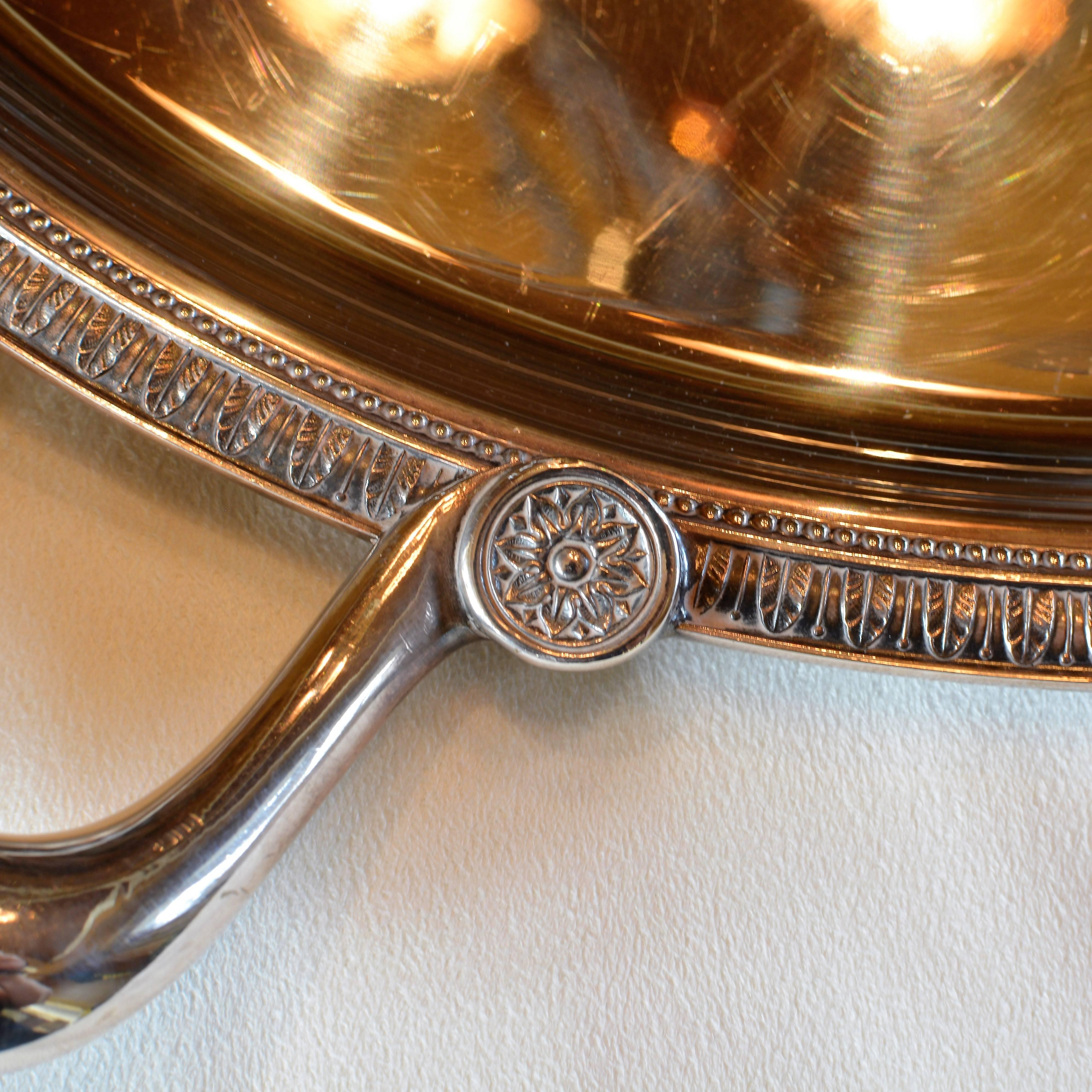 The Malmaison pattern large silver plated oval tray with two handles ideal for beverage service or tray-passed appetizers at any event. The name is a nod to the Chateau de la Malmaison, a favored Parisian residence of Napoleon Bonaparte and Empress