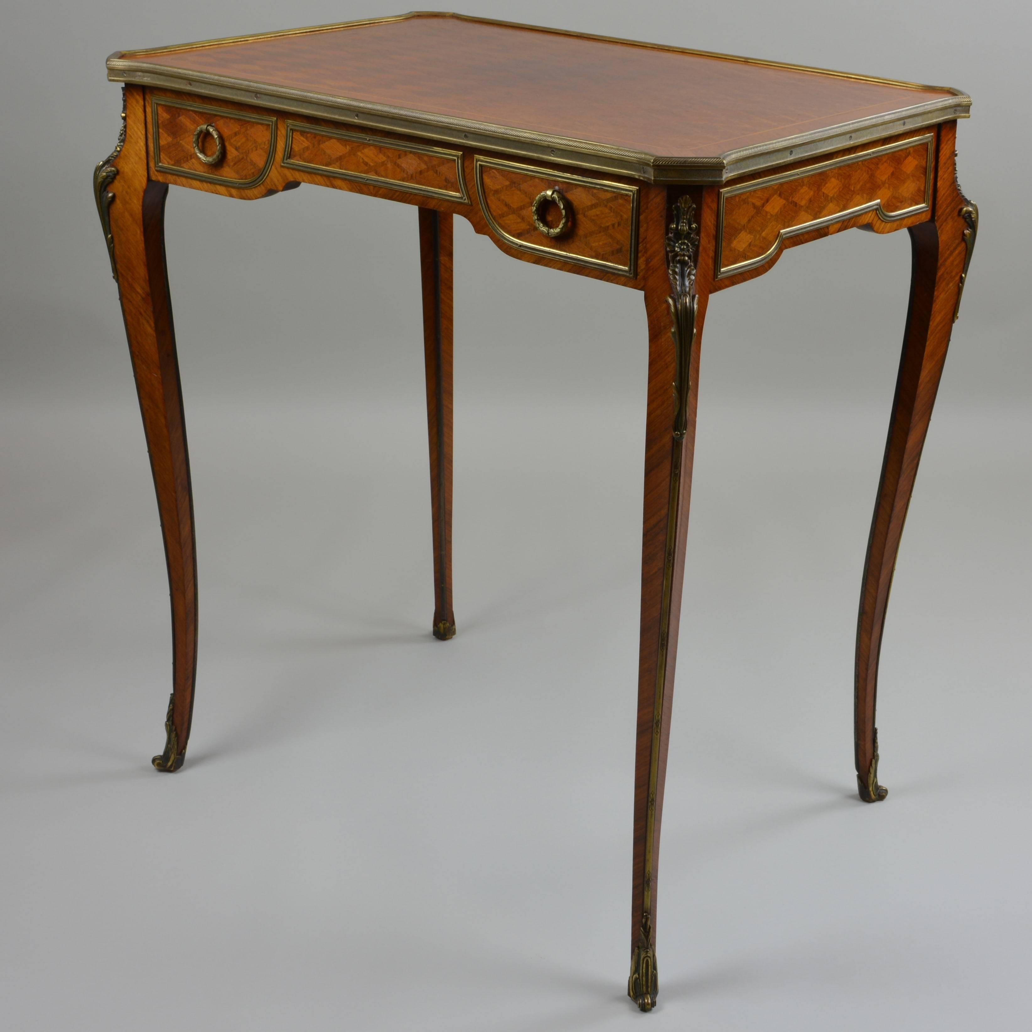 Tucking this small table away would be an injustice to the craftsmanship it quietly conveys. Beautifully joined wood veneers, understated diamond marquetry, and finely detailed brass ornamentation give this mid-19th century side table its enduring