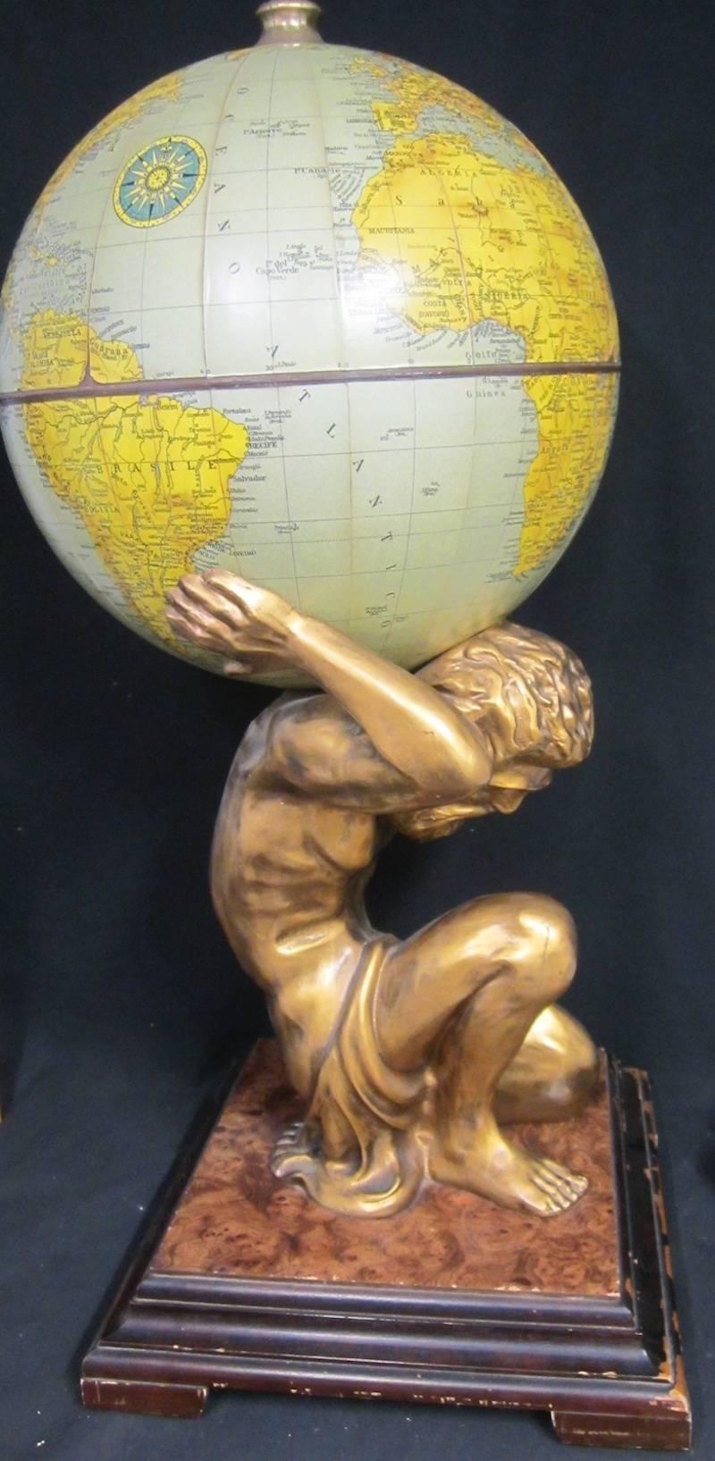 Large globe bar on the shoulders of Atlas,
Walnut and composite material, circa 1960s,
Measures: 46 x 46 x 110cm high.