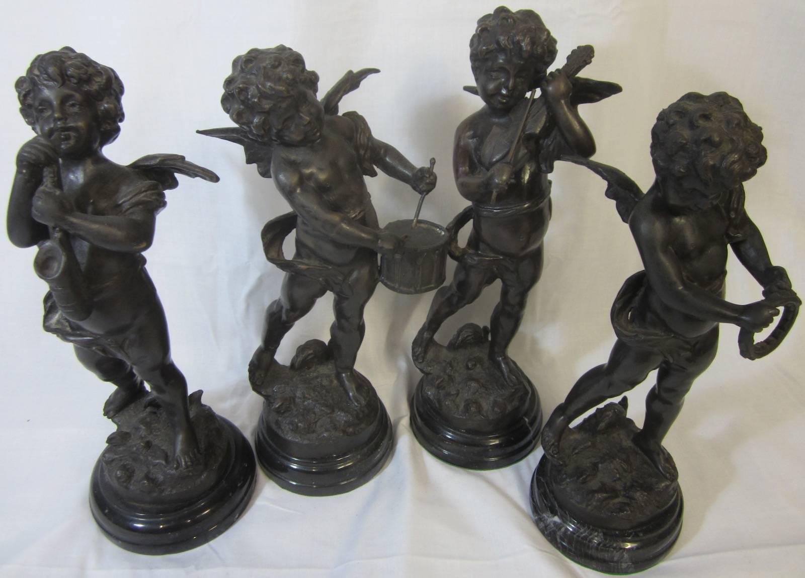 Set of four bronze replica musician figures in the style of Auguste Moreau, on marble bases, 12 x 35cm high.