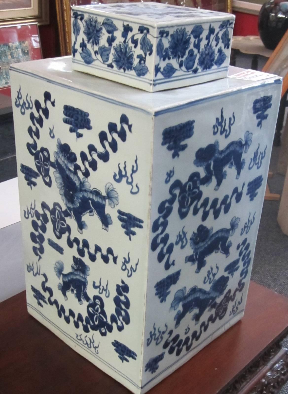 Blue and white lidded square Chinese ceramic urn, 
no markings on base.
This is a very unusual shape because of the difficulty of manufacture.