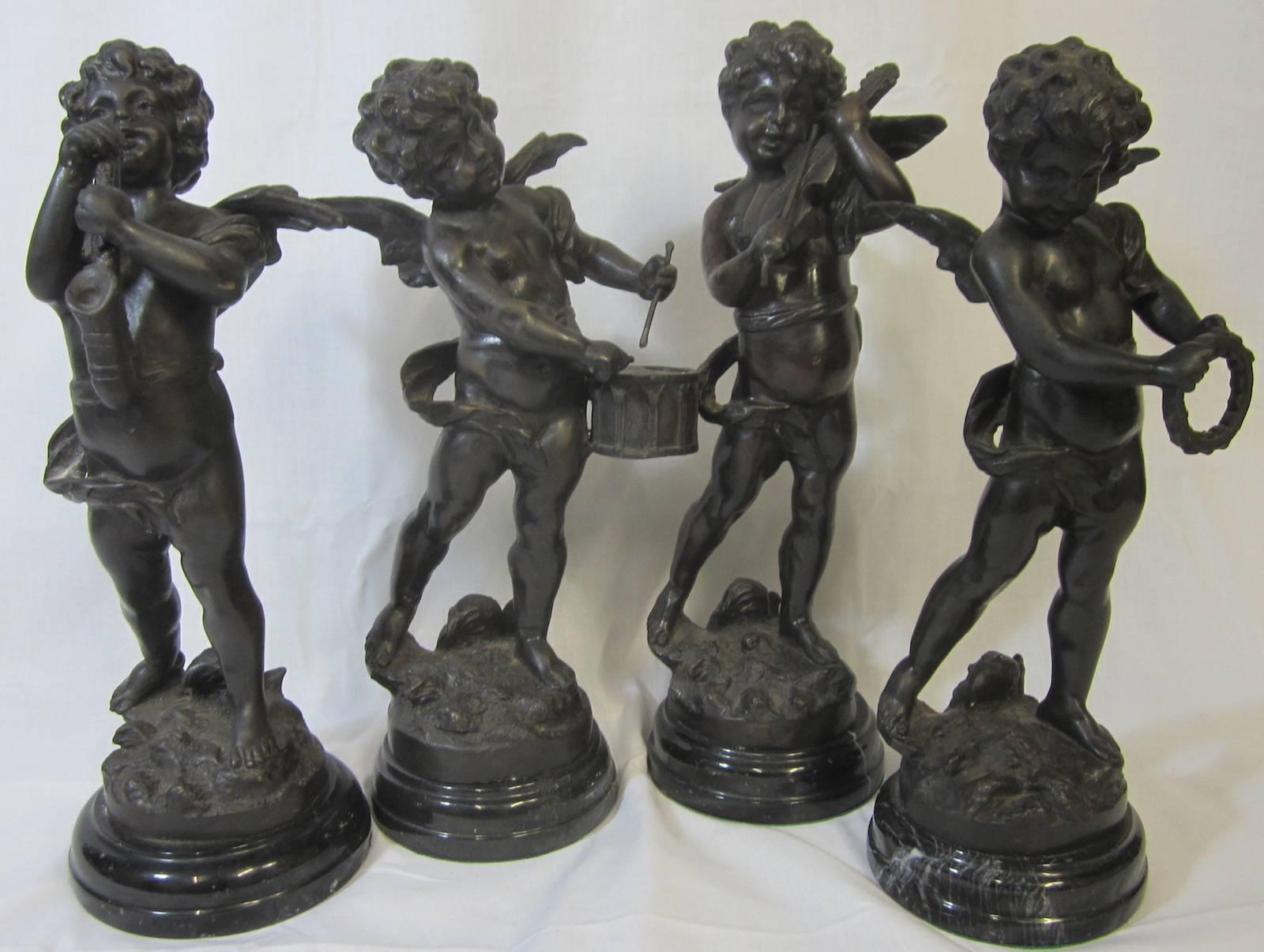 Cast Set of Four Bronze Musician Figures