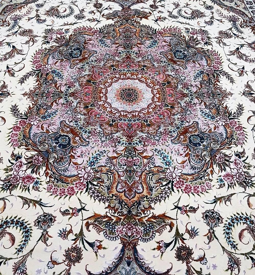 KPSI: 645
Origin: Tabriz, Iran
Composition: Silk and cork wool (high silk content)
Size: 300 cm x 200 cm
Description: This Persian carpet/rug is hand-knotted made by Mastercraftsman in Tabriz, Iran. Its a rare design consisting of Central design