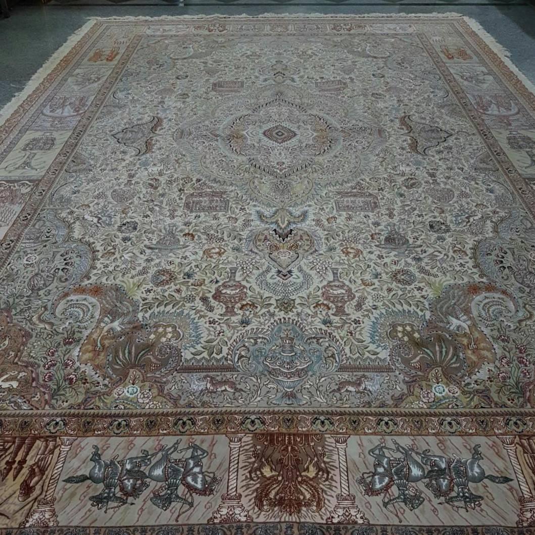 KPSI: 556
Origin: Tabriz, Iran
Composition: Silk and cork wool 
Size: 504 cm x 350 cm 
Description: Designer of this extraordinary piece is master Rassul Nami who is known for his beautiful Tabriz designed carpets. The design consists of