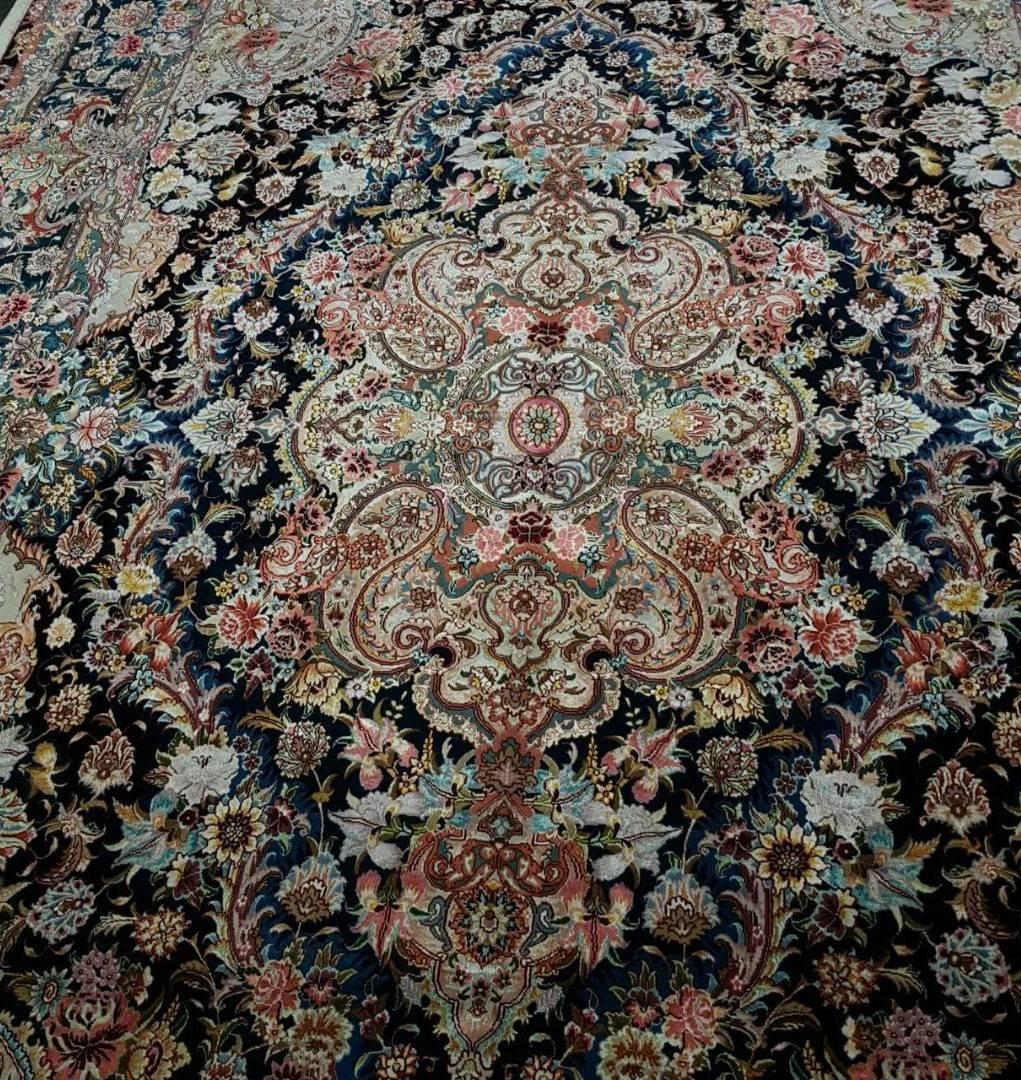 KPSI: 556
Origin: Tabriz, Iran
Composition: Silk and wool
Size: 305 cm x 200 cm 
Designer of this gorgeous piece is Master Salari who has his own fame and popularity amongst Persian carpet designers. This design has two main background colors as