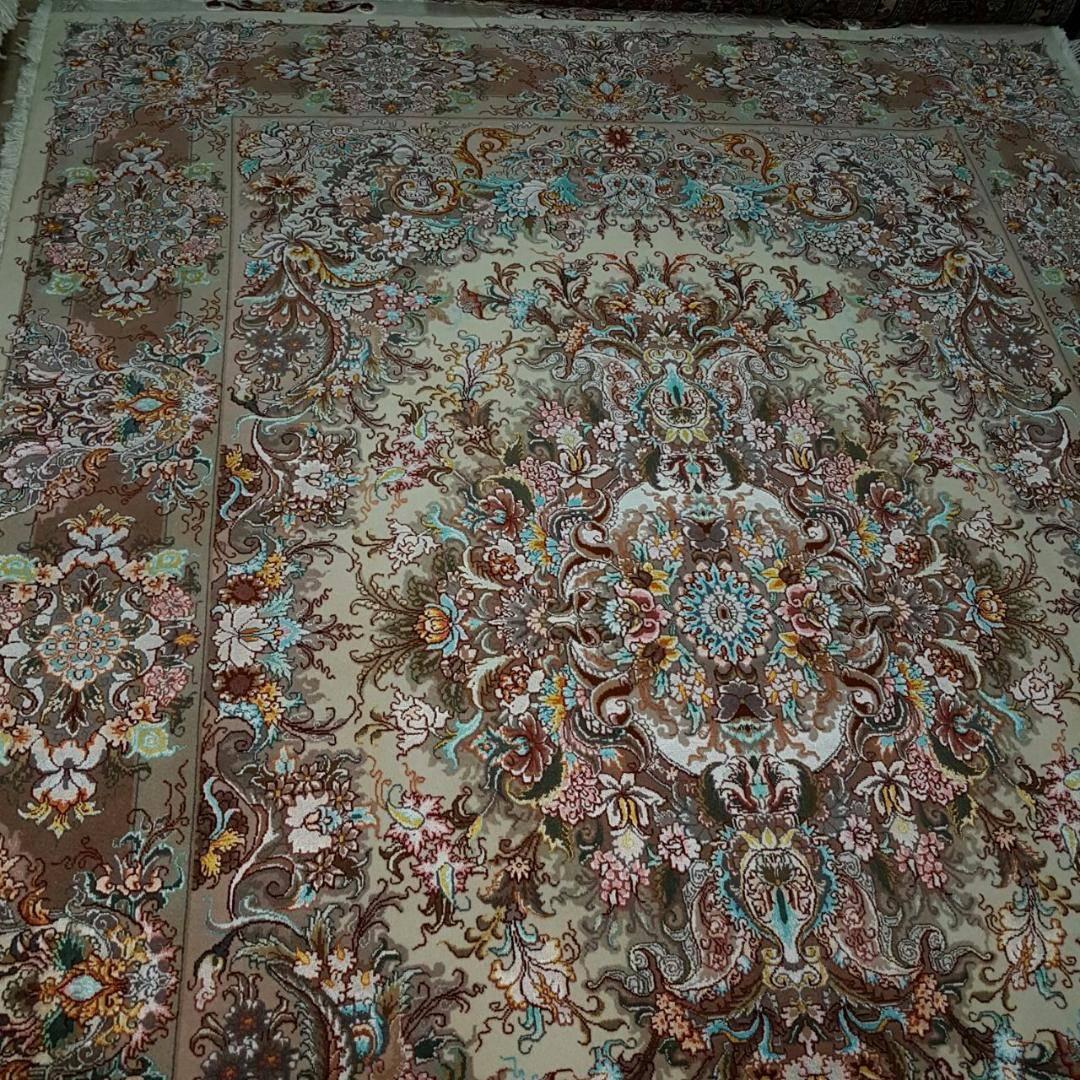 KPSI: 400
Origin: Tabriz, Iran
Composition: Silk and Merino Wool
Size: 208 cm x 150 cm
Description: Designer of this fine piece of art is Master Khatibi who has very intricate patterns on this carpet/rug. The angelic combination of colors in