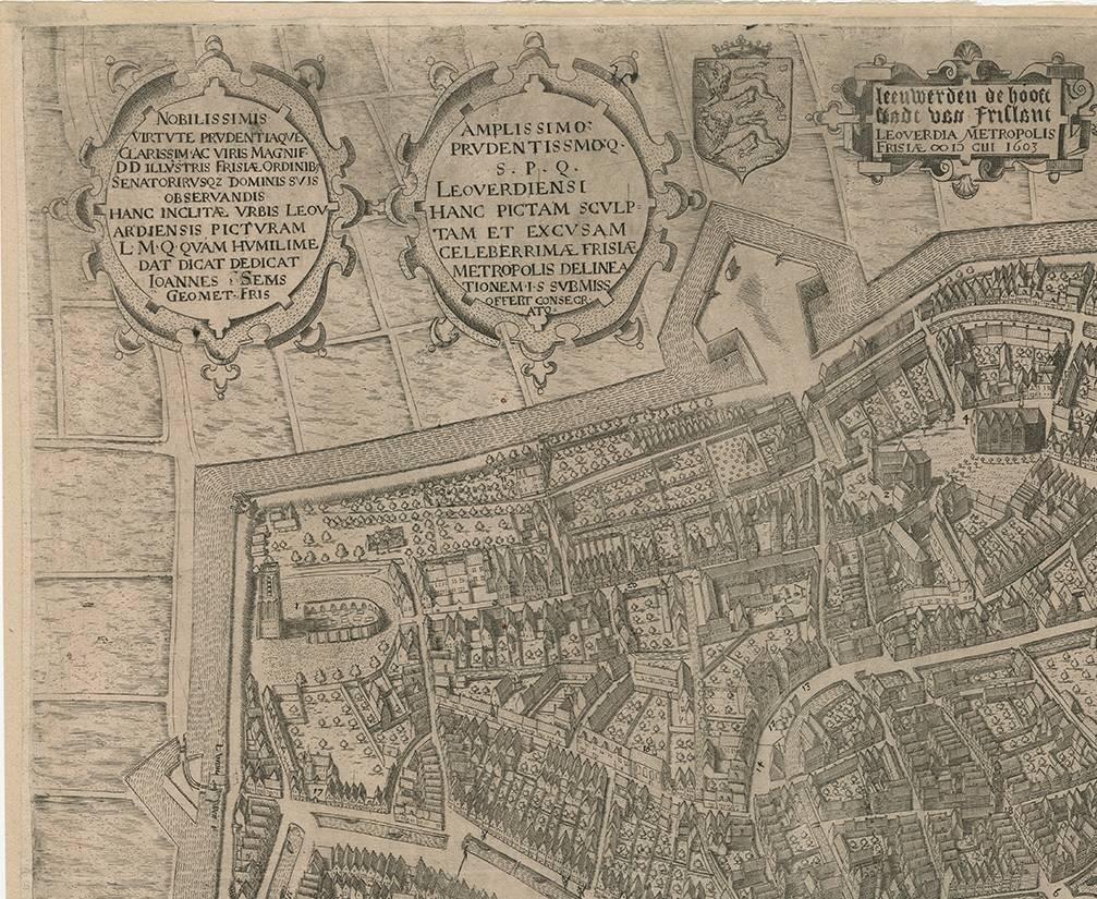 Very rare plan of Leeuwarden, Friesland, The Netherlands. With several cartouches and coat of arms. With a legend and compass rose at bottom right. Made by 'Pieter Bast' after the surveyor Johan Sems, published by Ioannem / Jan Lamrinck in 1603.