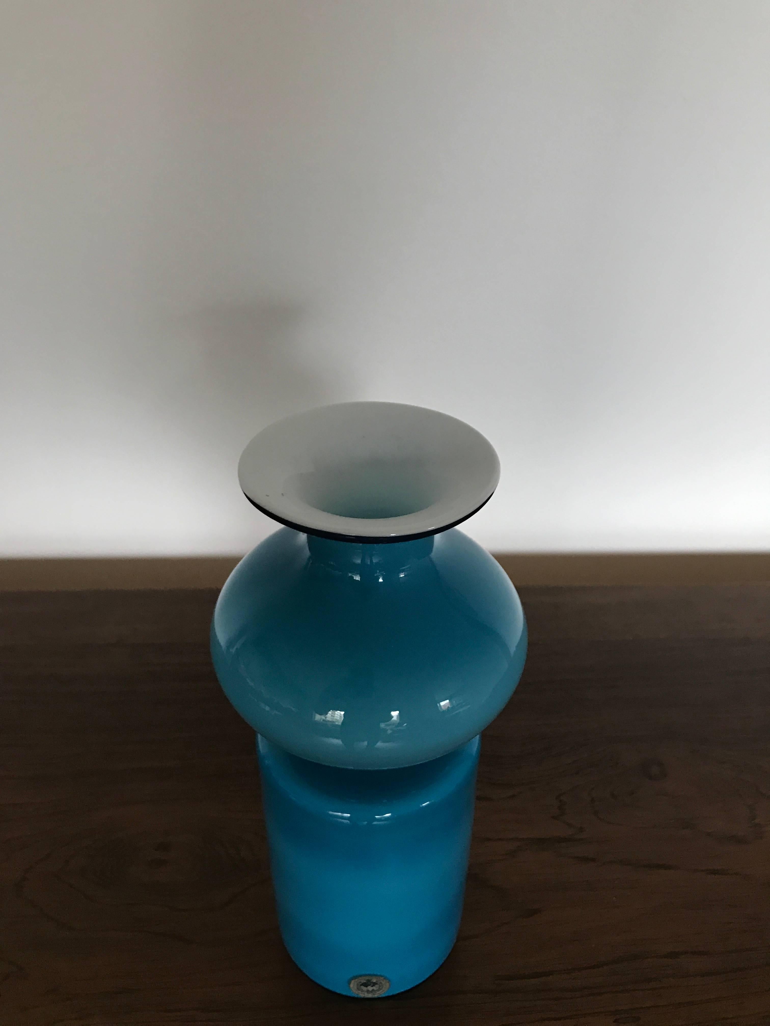 Blue glass vase from Holmegaard in Denmark, 1960s, designed by Michael Bang, measure: Diameter 6 cm and height 23 cm. Very good condition.