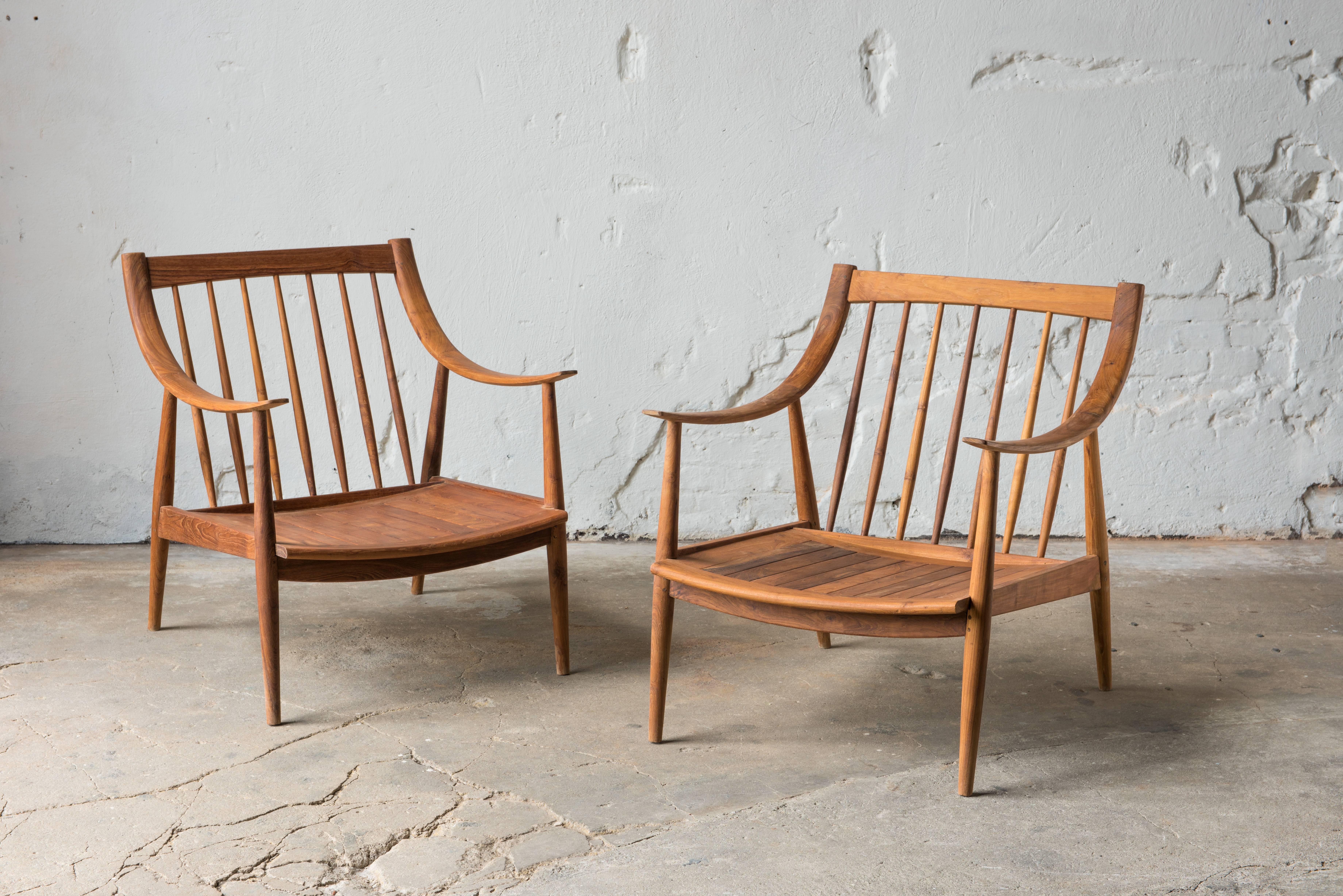 21th century lounge chairs in teak wood. 
Hand sown cushions. Removable textile by Josef Franck / Svensk Tenn, Vegetable Tree. 

Designed and branded by R+R Sweden.