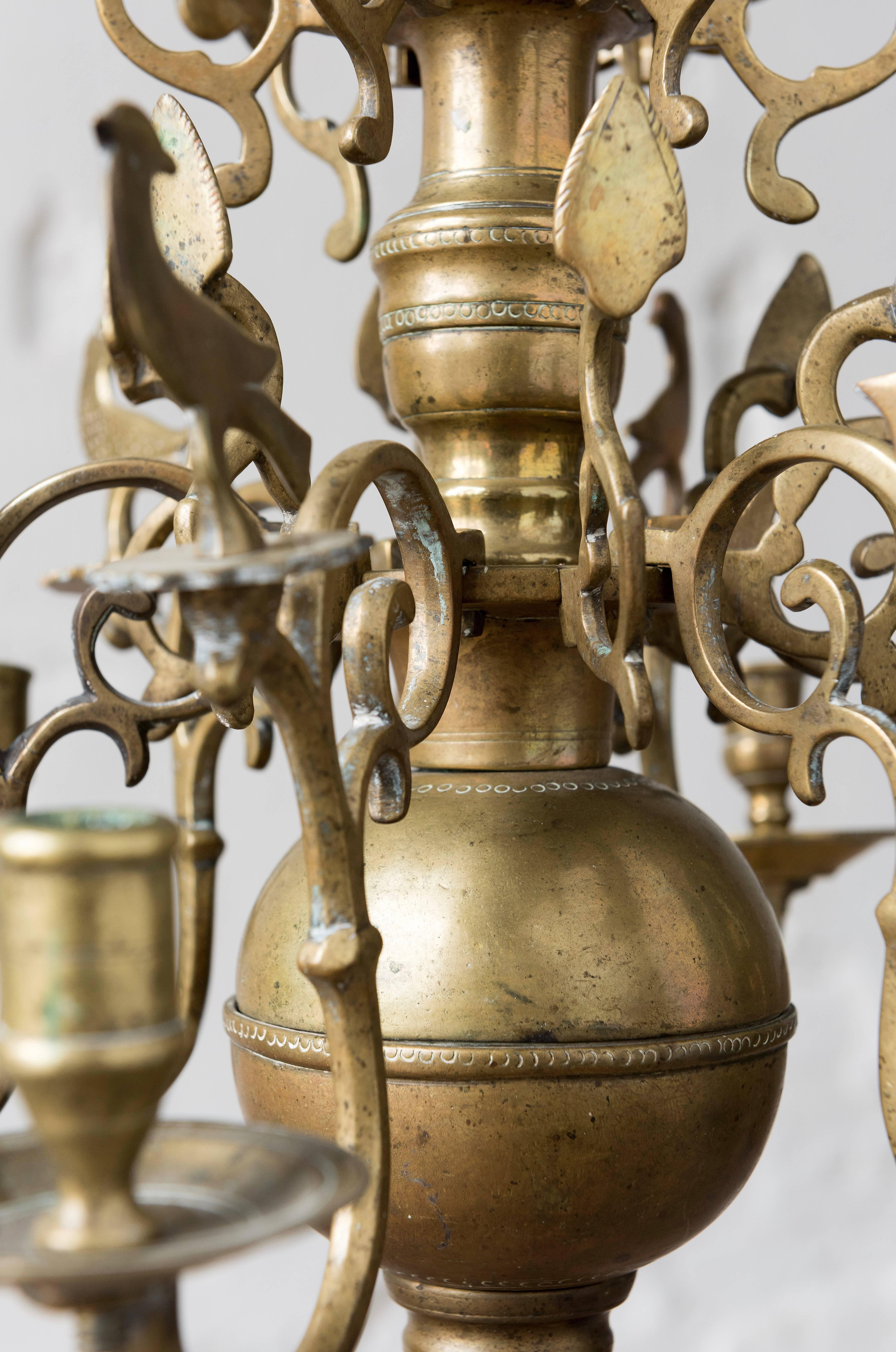 17th century Netherland or German six-light brass chandelier
Brass Baroque six-light chandelier cast and worked in 17th century.
Holes on body made later for electricity wiring
Otherwise in original untouched condition.
  