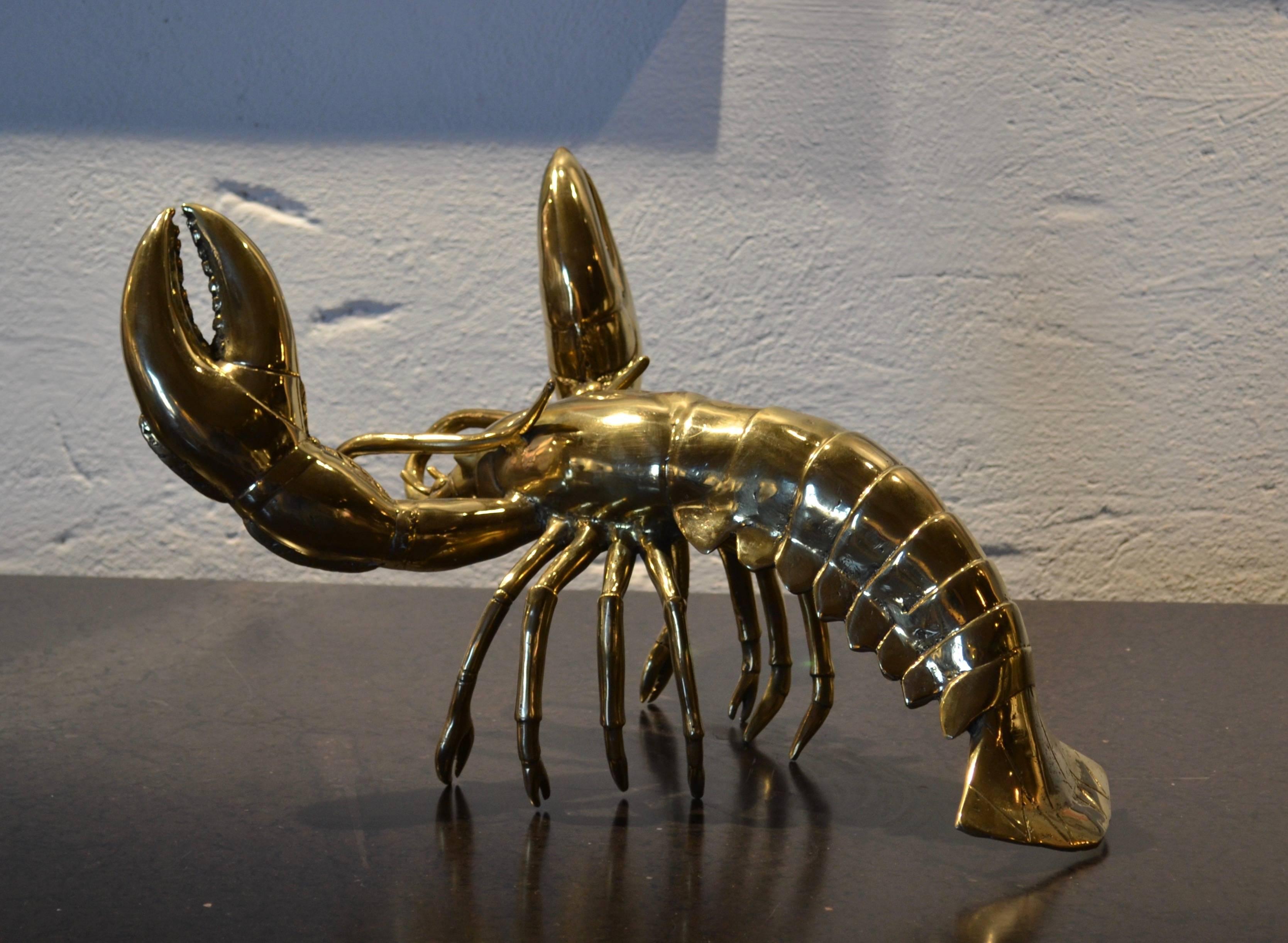 Lobster sculpture in gilt bronze.
The perfect sculpture for a seafood lover, fisherman or seafood restaurant.
It has excellent patina and is a definite centrepiece of the room.
A rare seen wow factor in this object.