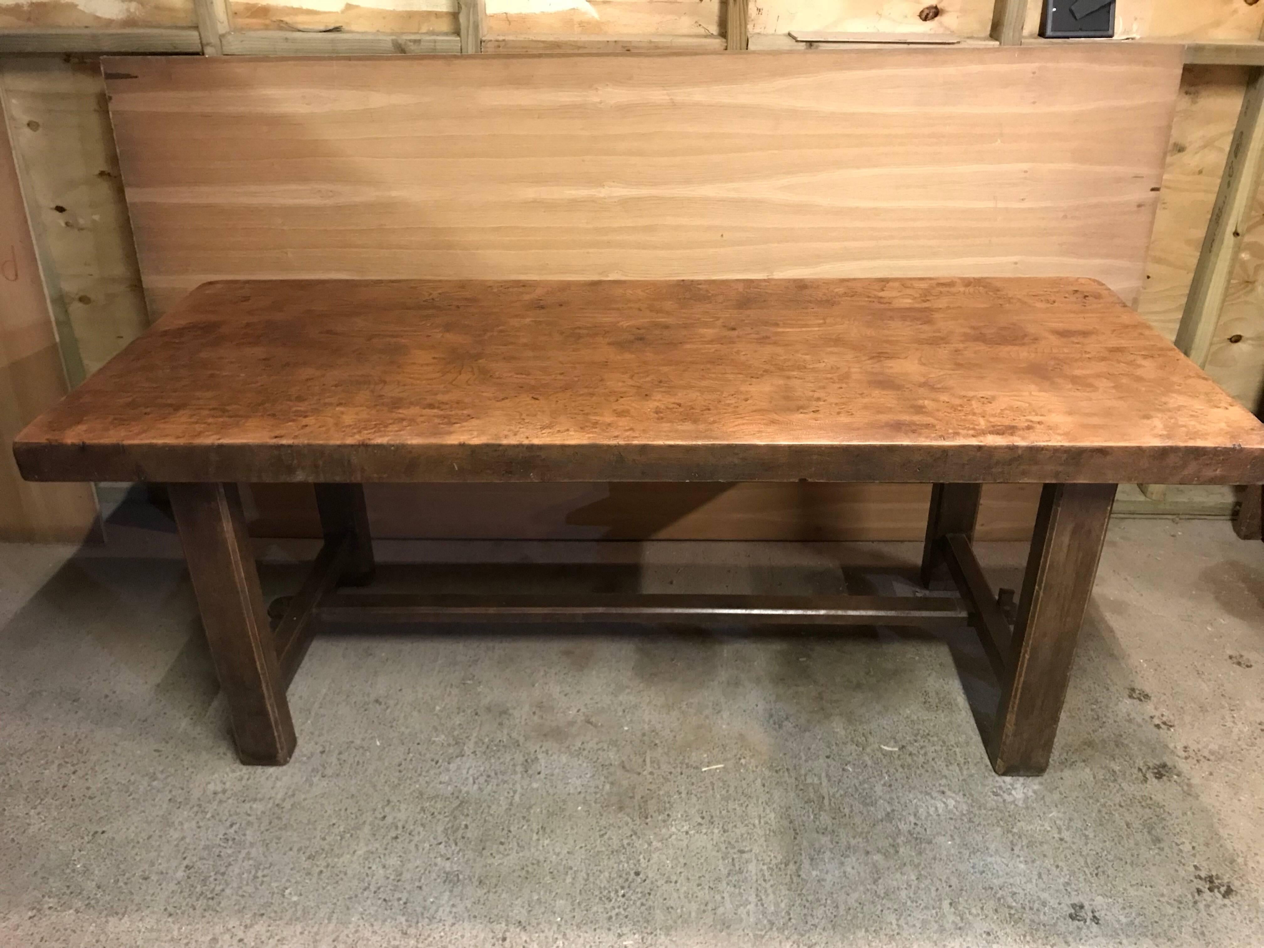 A beautiful 19th century thick top rustic elm farmhouse table with a glorious top. This table would look fabulous in most settings, with its rustic feel and well figured top. The table seats up to 8 people comfortably. Very sturdy base and gorgeous
