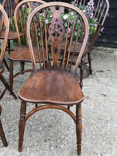 20th Century Set of 12 Thames Estuary Prior Style Wheel Back Windsor Chairs