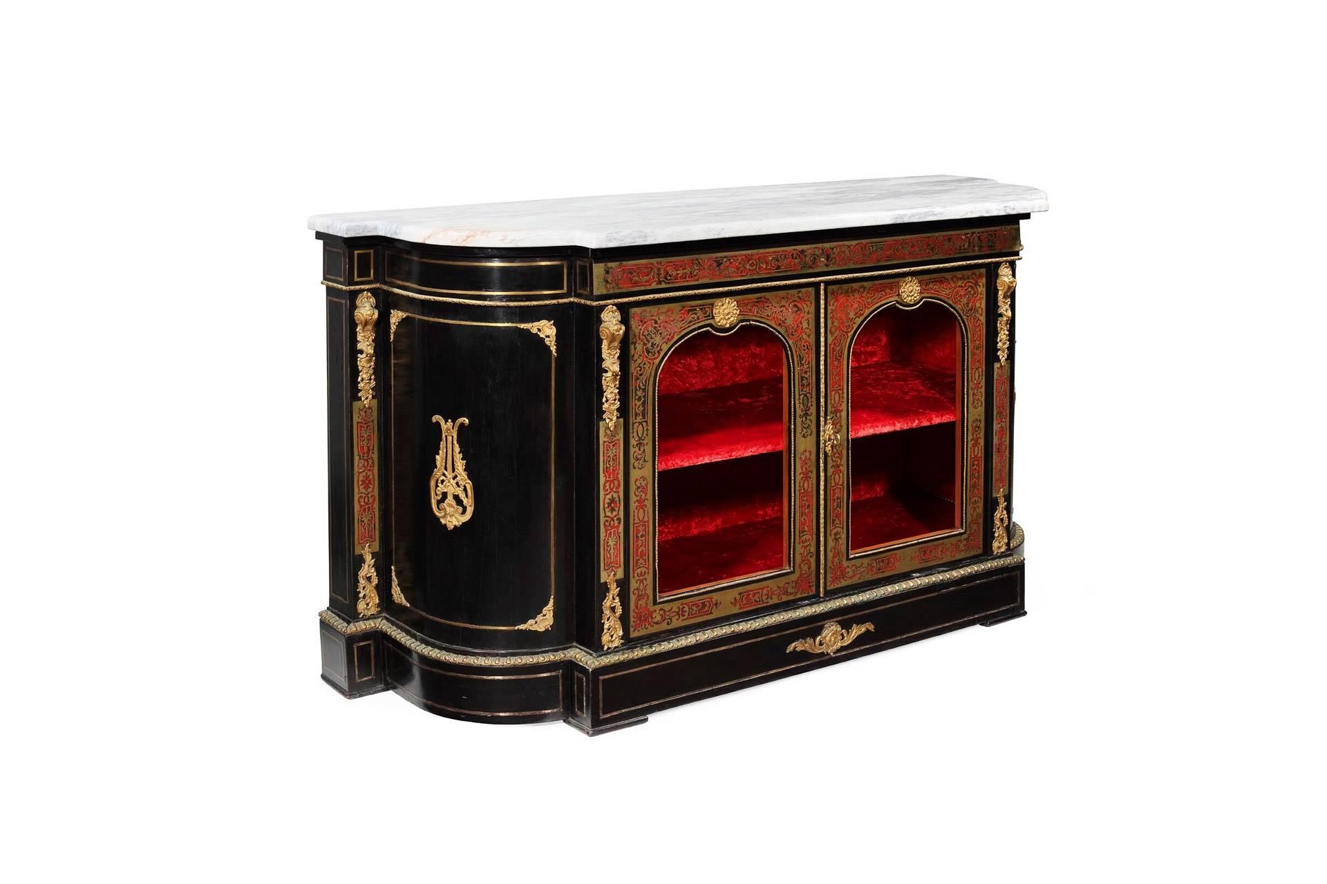 Boulle credenza with tortoiseshell and metal inlay. Beautiful white marble top, transparent glass doors and interior upholstered in red velvet. Decorative brass applications throughout.
 