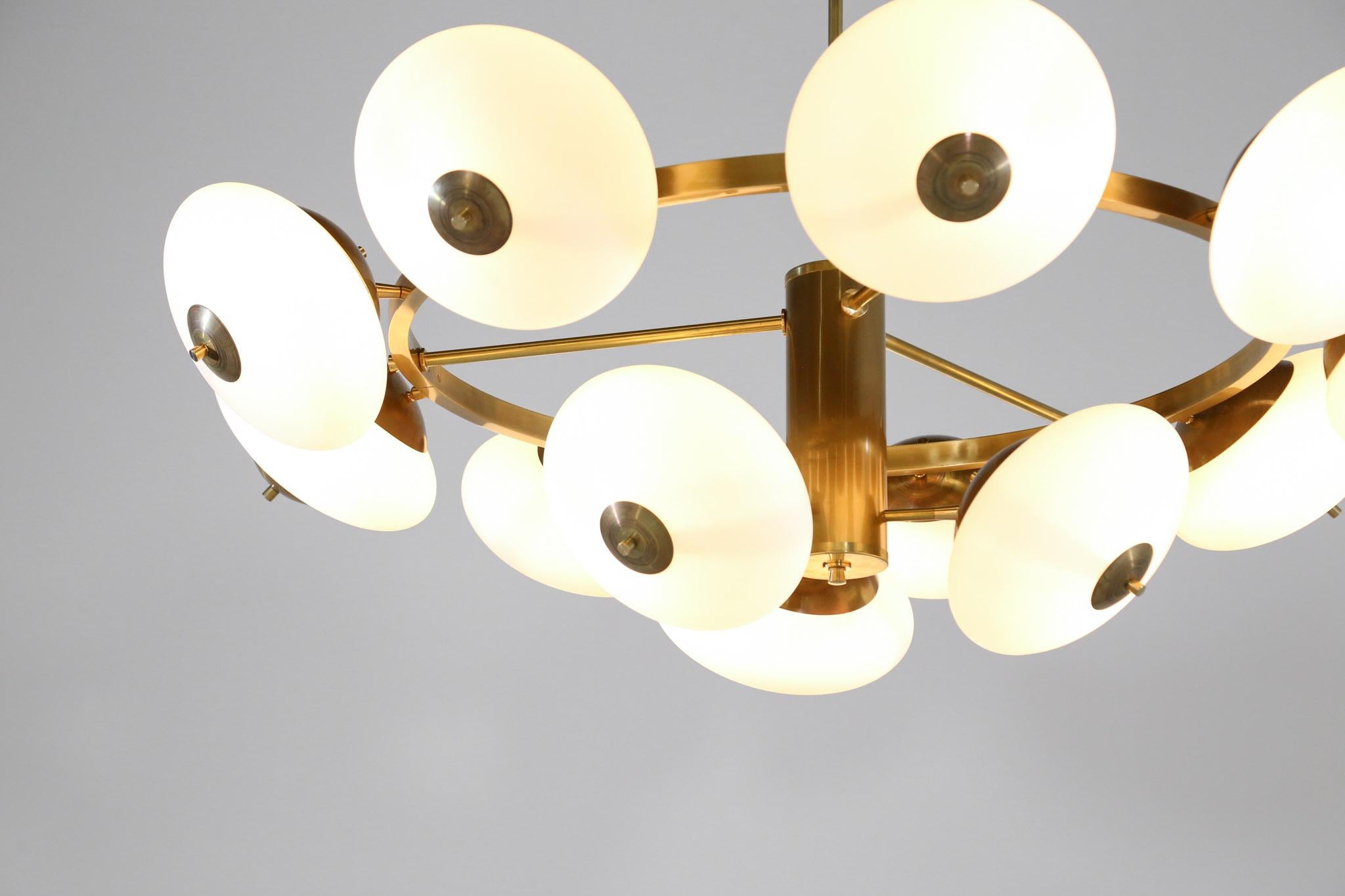Large round contemporary chandelier in brass and opaline glasses.
E14 bulb (15w).

Can be customized.