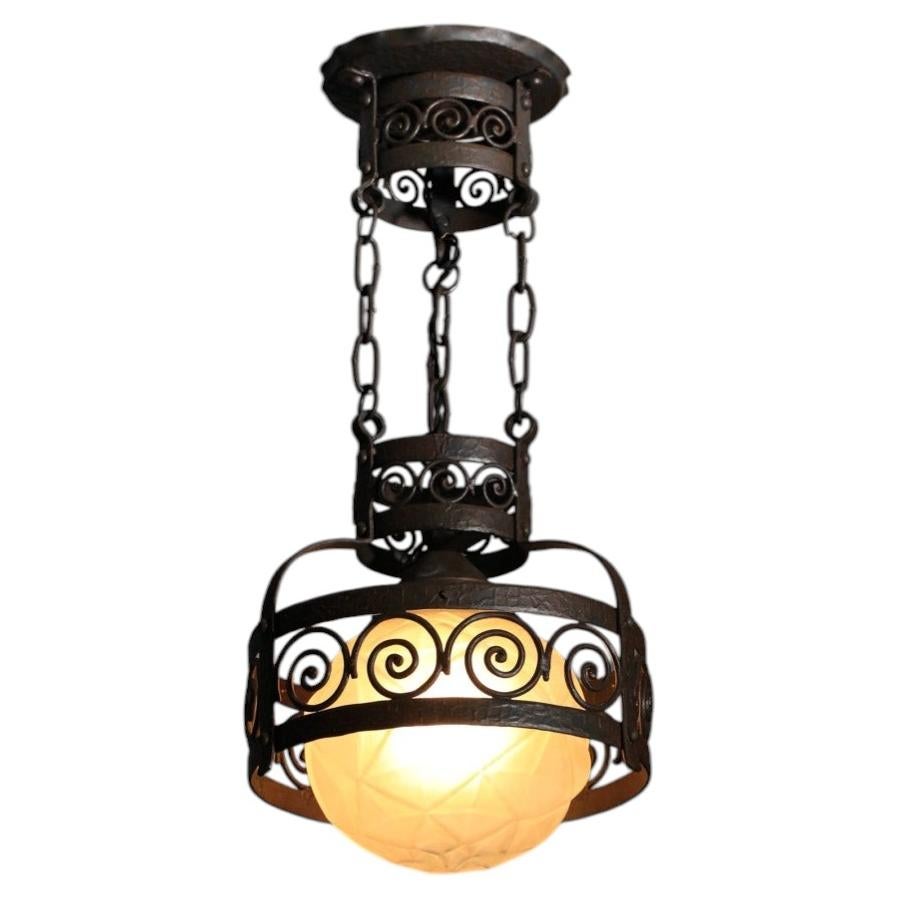 Small 1930s German-style lantern chandelier with glass globe For Sale