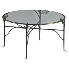 Bronze dining table with foliage decoration and glass top, 1980s, K172