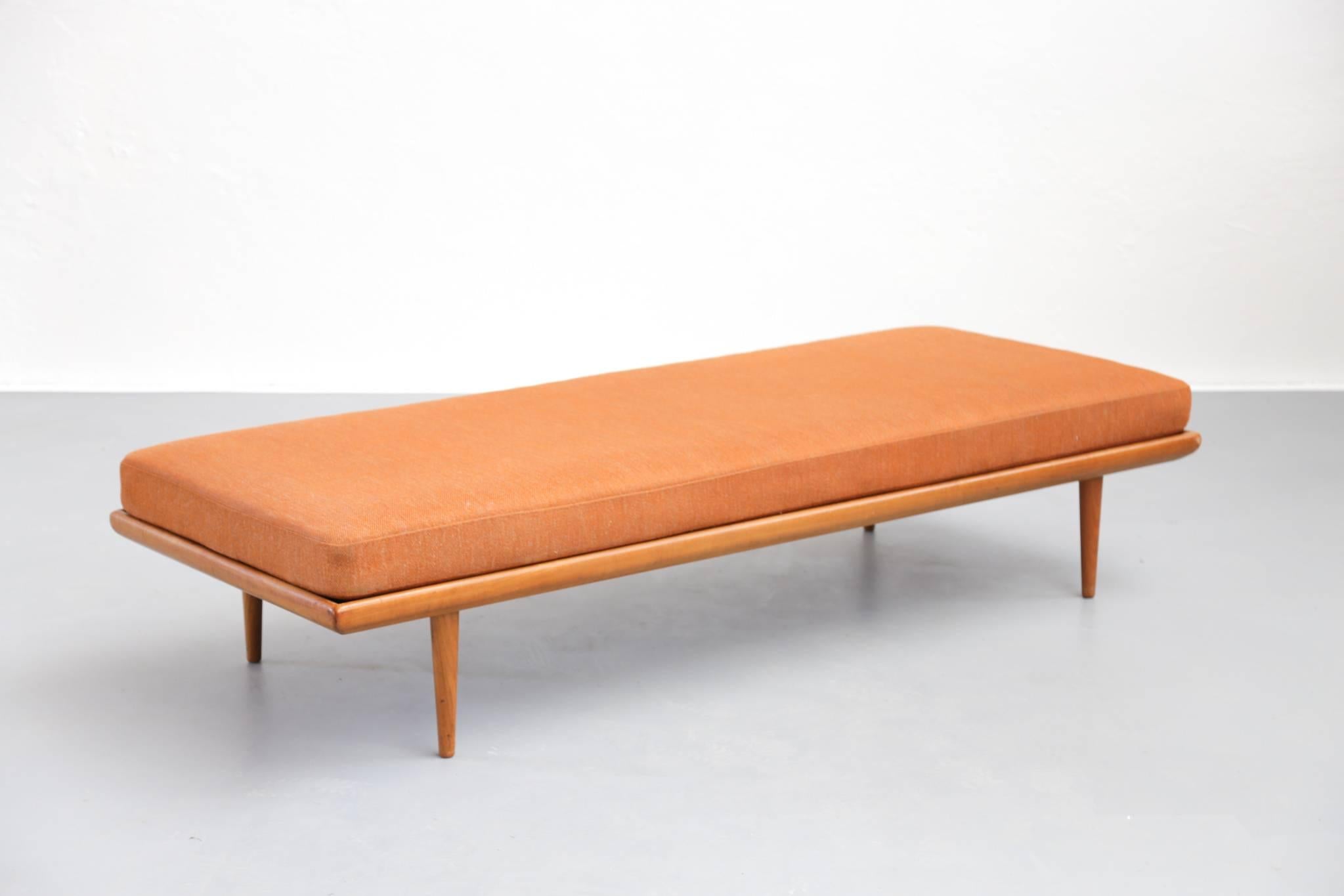 Daybed from 1960s design by Peter Hvidt and editing by France and Son.
This modern daybed is made of a frame teak wood and a orange fabric.
Furniture in very good original condition.
 
