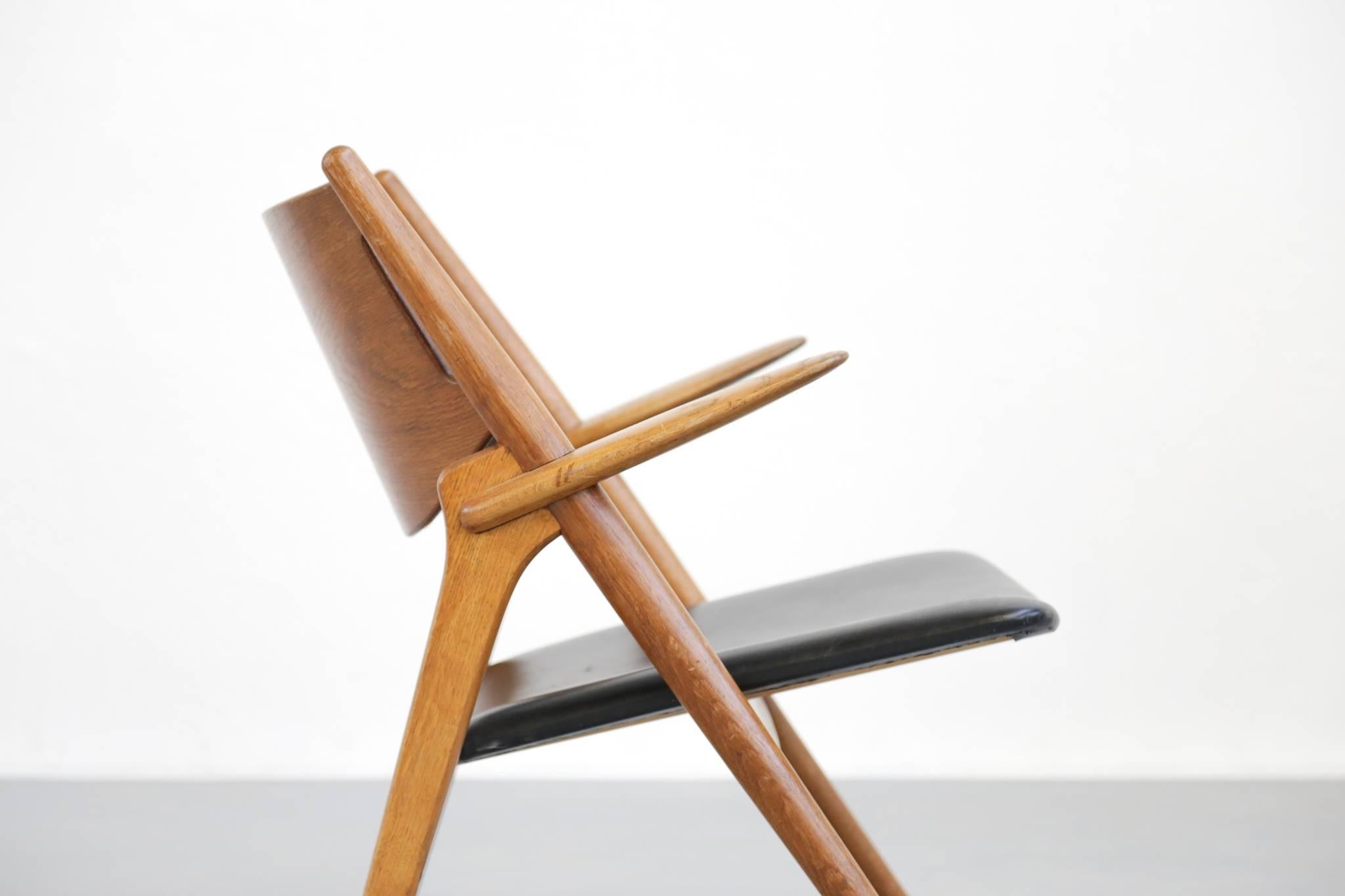 Scandinave moderne Hans Wegner Danish Lounge Chair CH28 Sawback, années 1950 Scandinave en vente