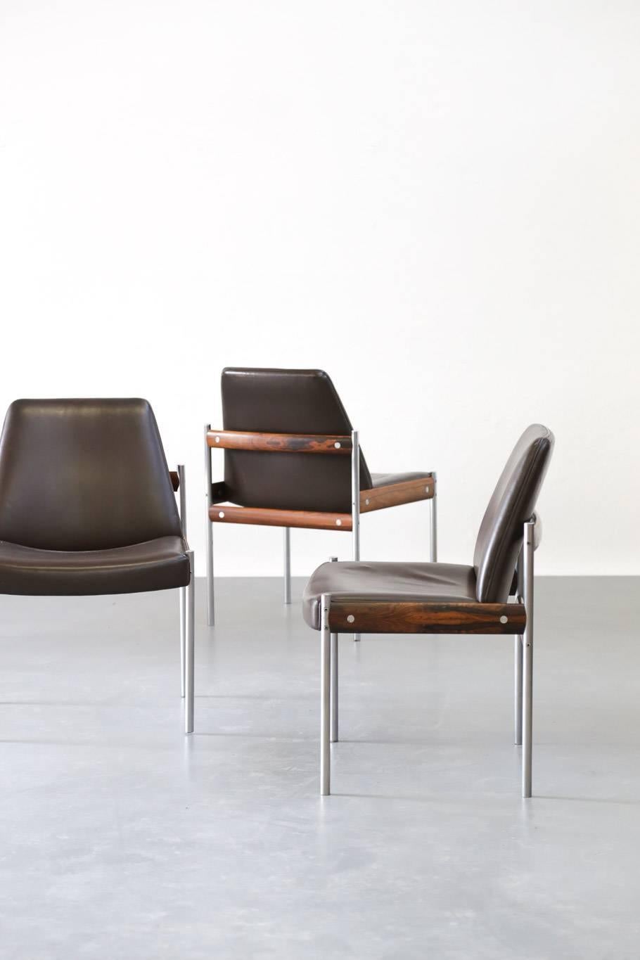 The set has four matching chairs with a metal frame, teak crossbars and leather seat and backrest.
Designed by Sven Ivar Dysthe for Dokka Mobler, 1960s.