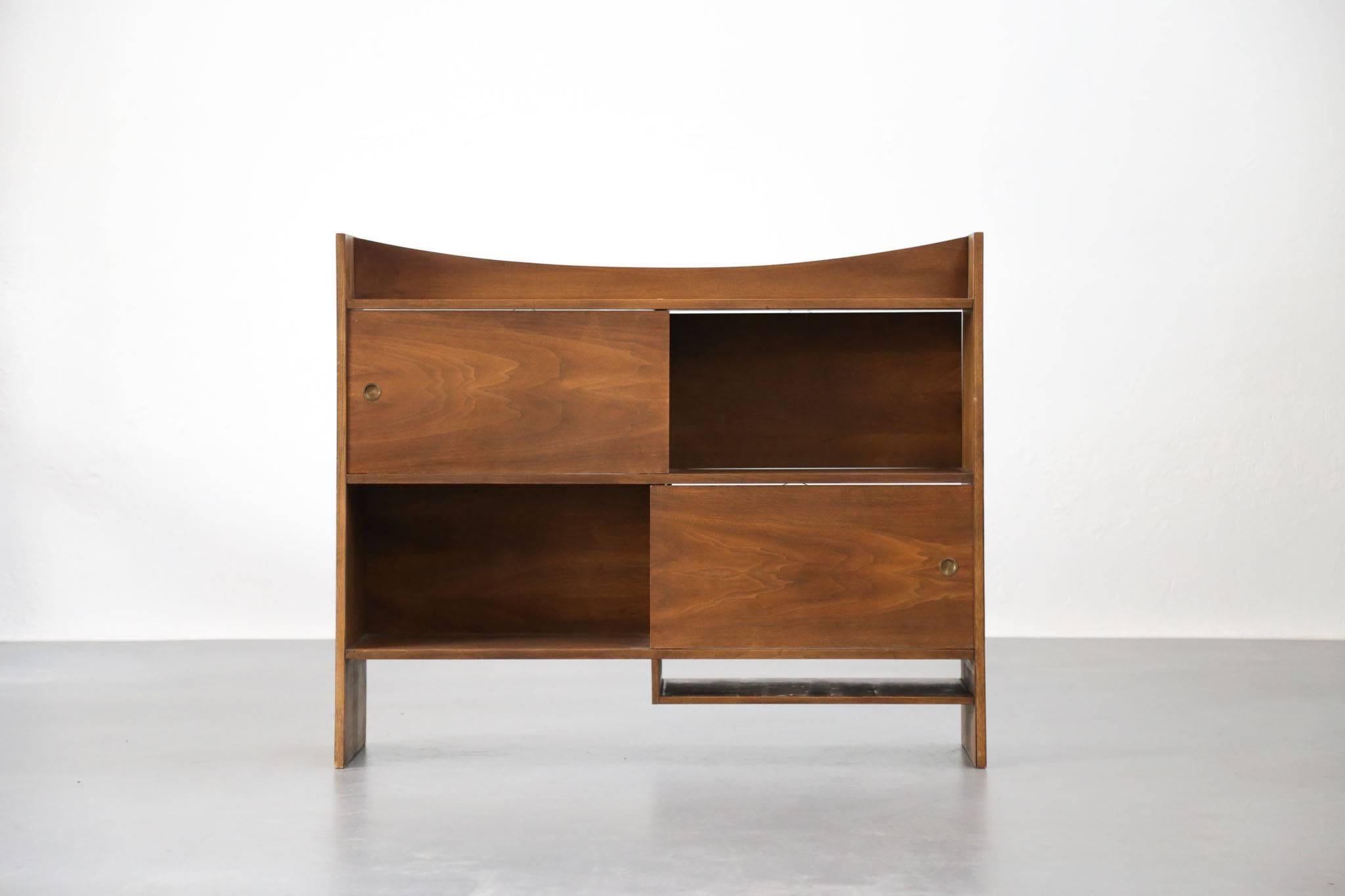 Cabinet, bookcases, commode in the style of Pierre Jeanneret
Two face with four sliding doors.
Room divided.