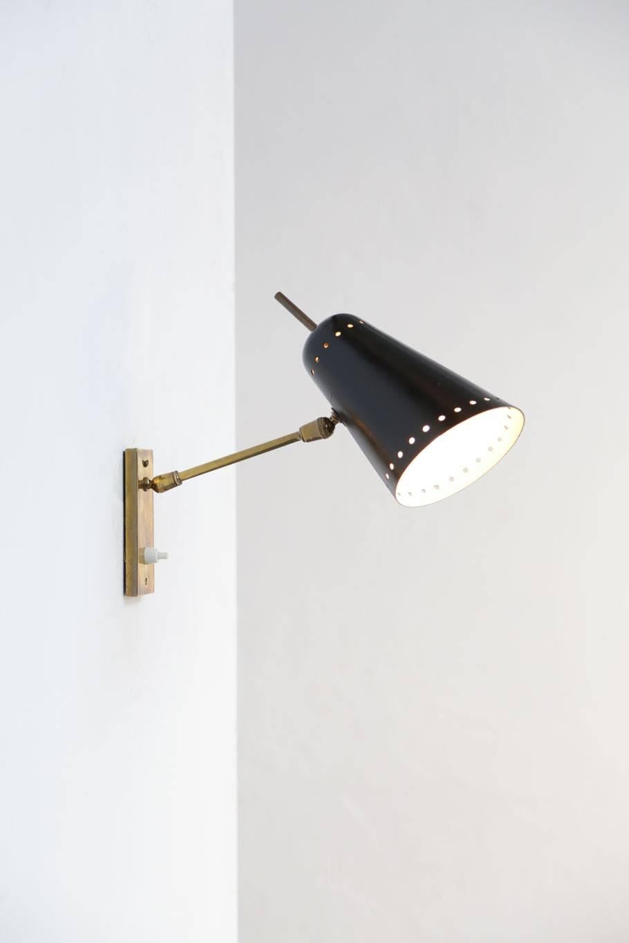 Wall light made of brass and lacquered metal from 1960s.
