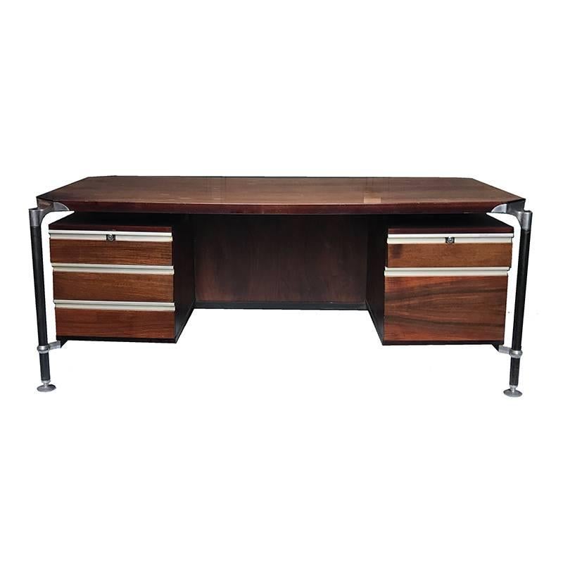 Desk designed by Luisa and Ico Parisi made in 1958 for MIM (Mobili Italiani Moderni) this desk combines excellent design with durable construction. A great example of Italian modernist design! Beautiful rosewood with three drawers on the left and