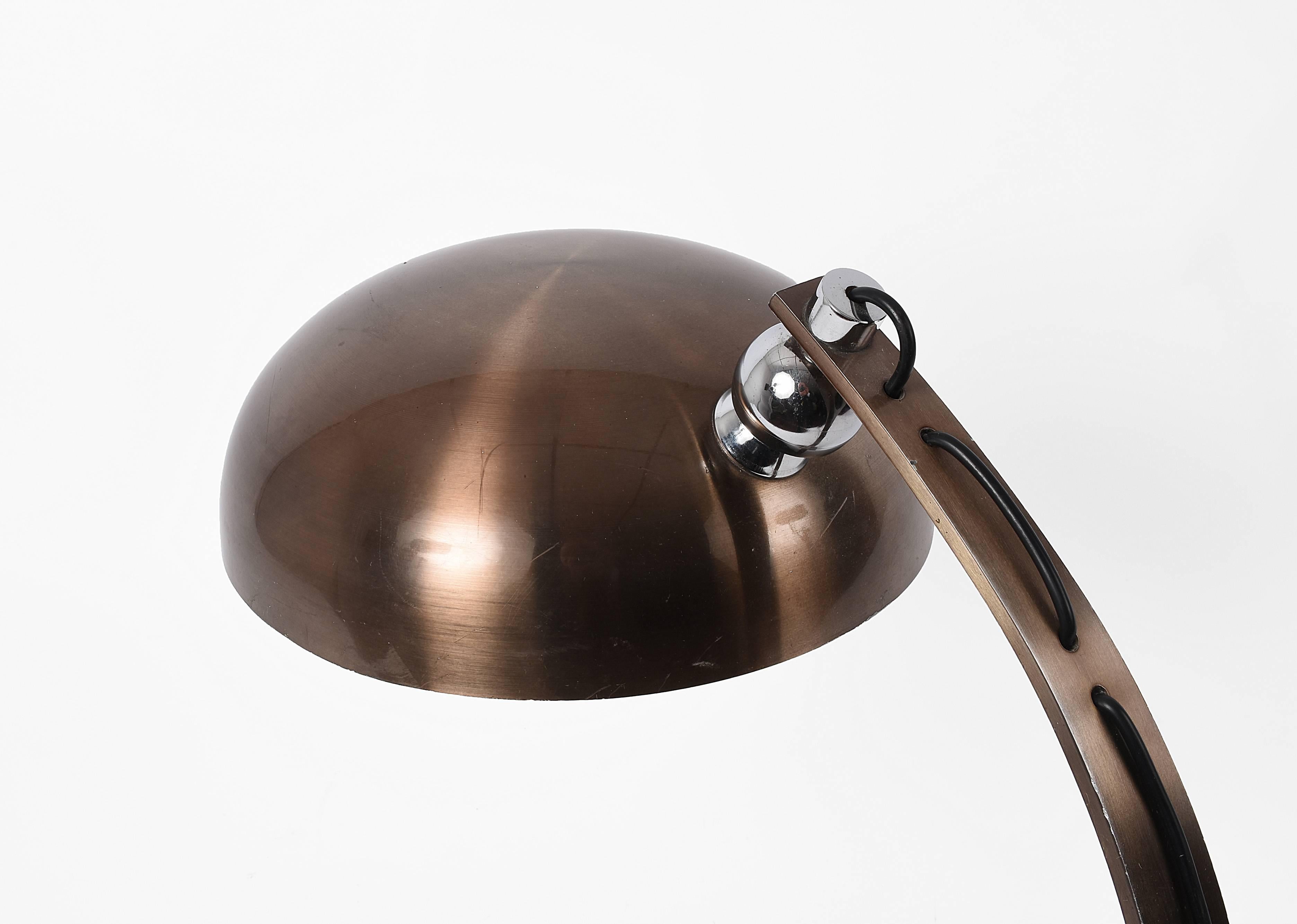 Beautiful and large table lamp attributed to Arredoluce. Adjustable bronzed aluminum.