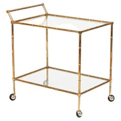 Carrello da bar Maison Jansen in ottone e cristallo con finitura finto bambù, anni '70